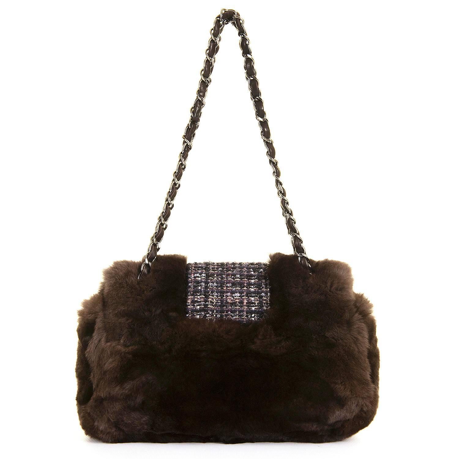 A rare, Limited Edition, ' Sac Classique' Shoulder Bag by Karl Lagerfeld for Chanel, finished in Choclate Brown Fur, accented with a check Tweed, finished with Silver Palladium hardware. The flap is fitted with a 'Madamoiselle' clasp with the