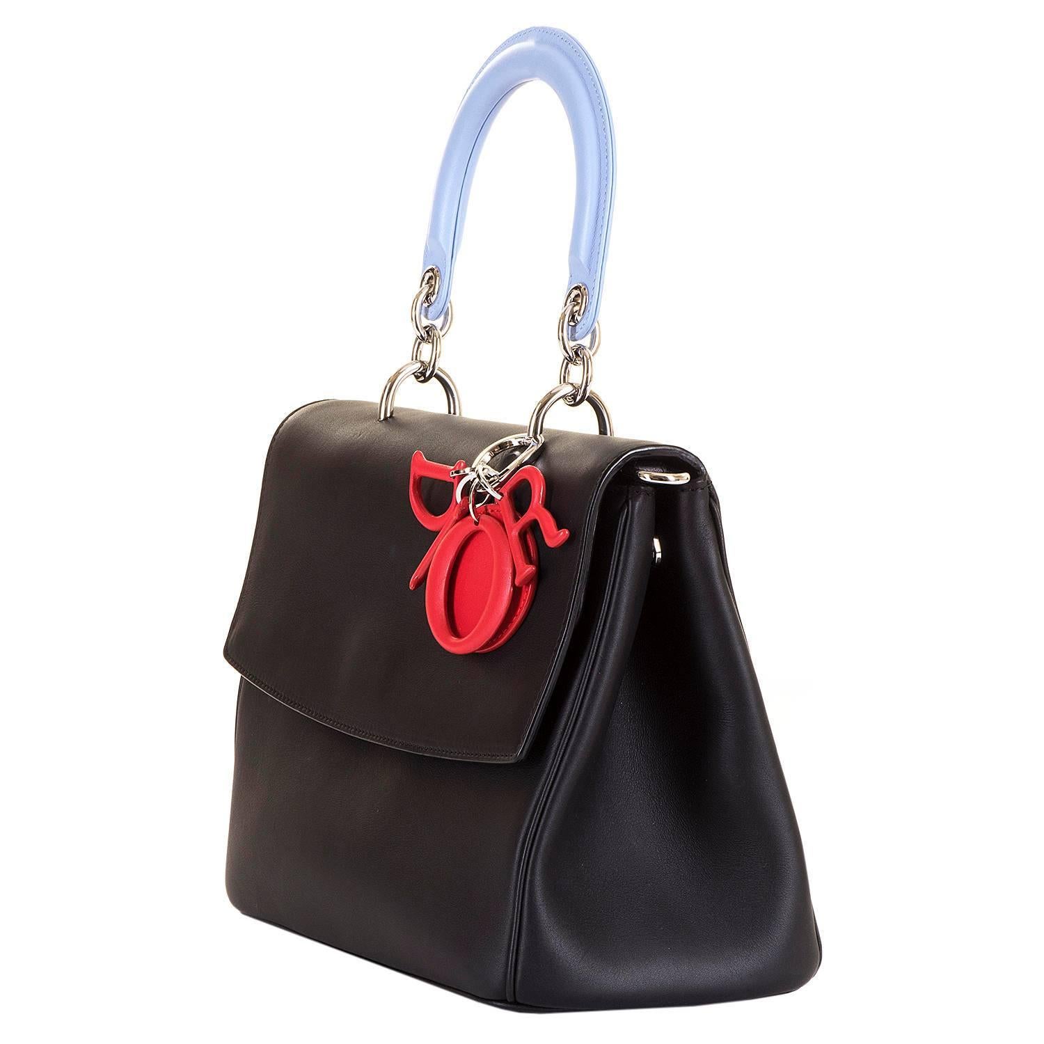 A simply stunning and Rare, Limited Edition, Dior 'Be Dior' tricolour Handbag & Shoulder Bag. In pristine 'Store-Fresh' condition the bag is finished in Matt Black, Poster Red & Wedgwood Blue, enhanced with Silver Palladium Hardware. The