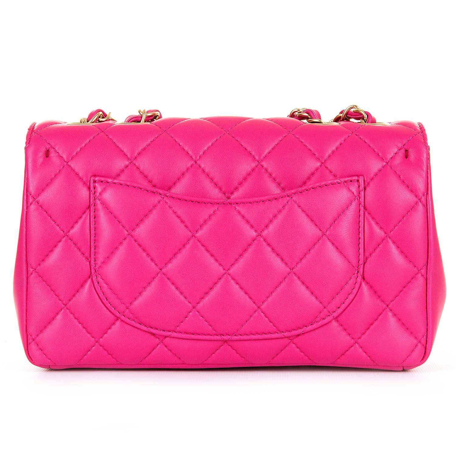 Absolutely stunning Chanel lipstick pink 'Chic Quilt' shoulder bag or clutch. The lipstick pink quilted lambskin leather is finished with Satin-gold hardware and with the adjustable double strap, the bag can be worn as a cross body, shoulder, or