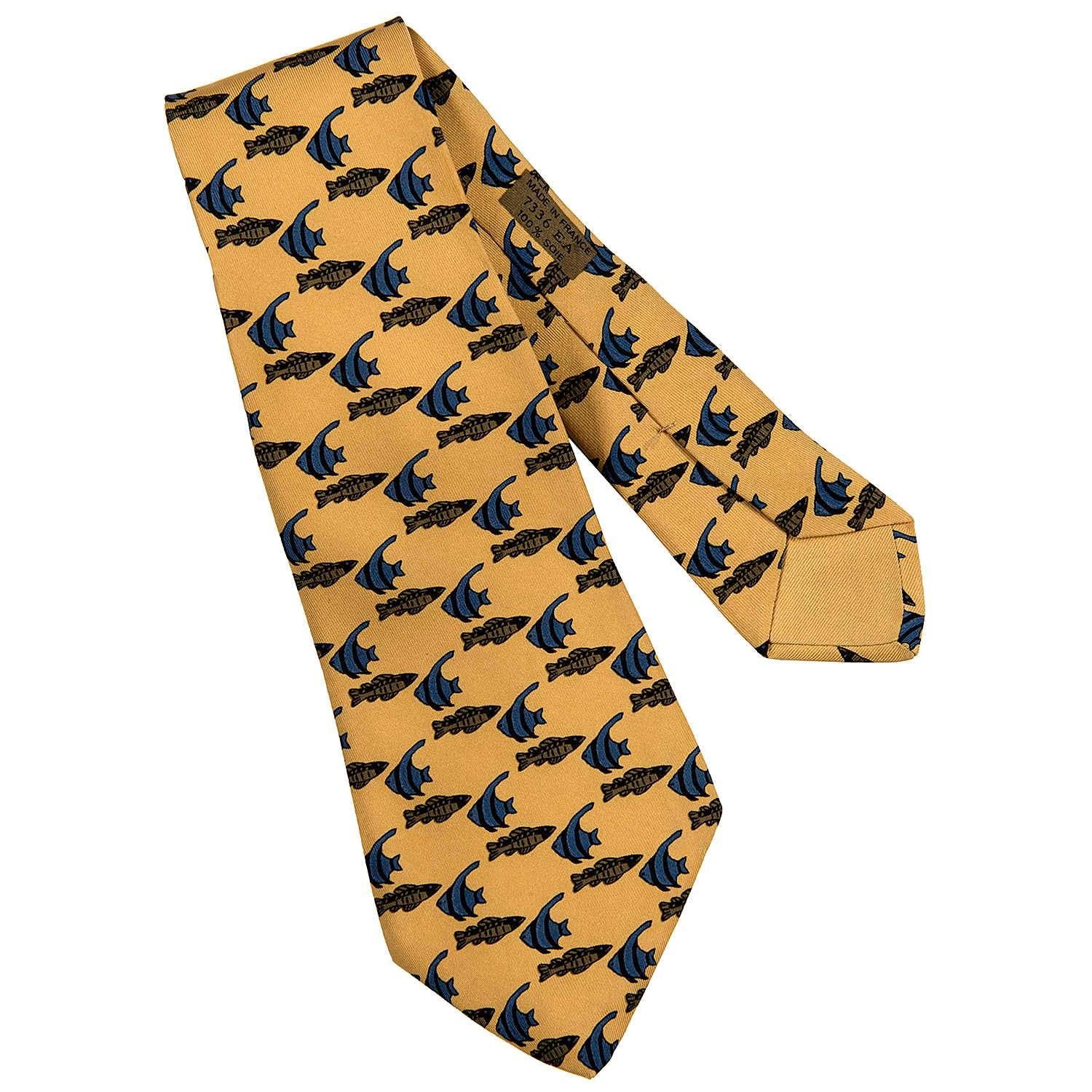 A Rare Vintage Hermes Silk Tie 'Angel Fish'. In pristine condition it comes with it's original Hermes Box. The perfect 
gift !! 