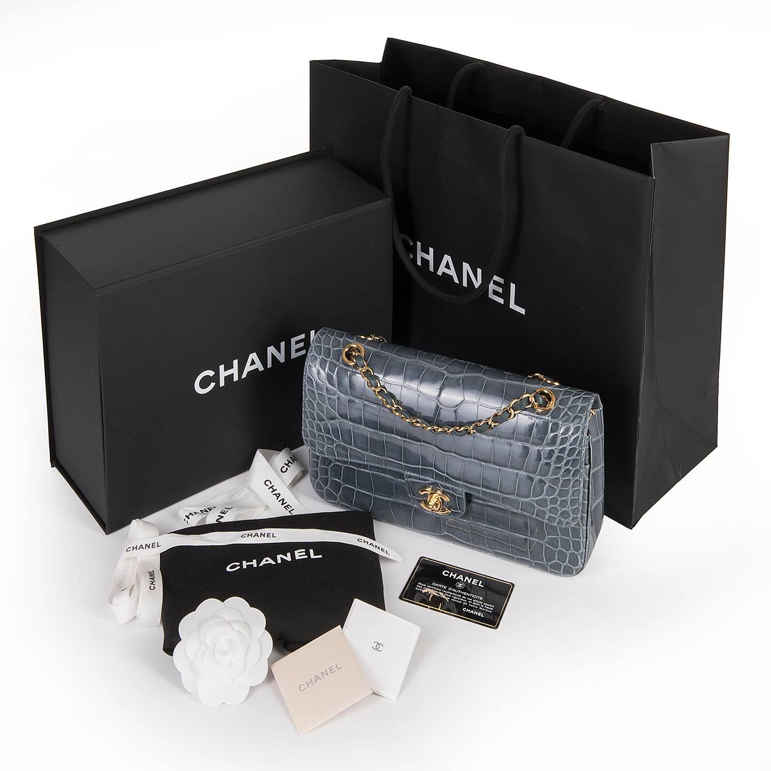 Such a Rare Bag !! This Chanel Medium Double-flap Alligator 'Sac Timeless' in a very rare colour - Graphite Blue is finished with luxury Gold hardware. So collectable, the bag is in pristine, 'Store-fresh' condition and comes absolutely complete,