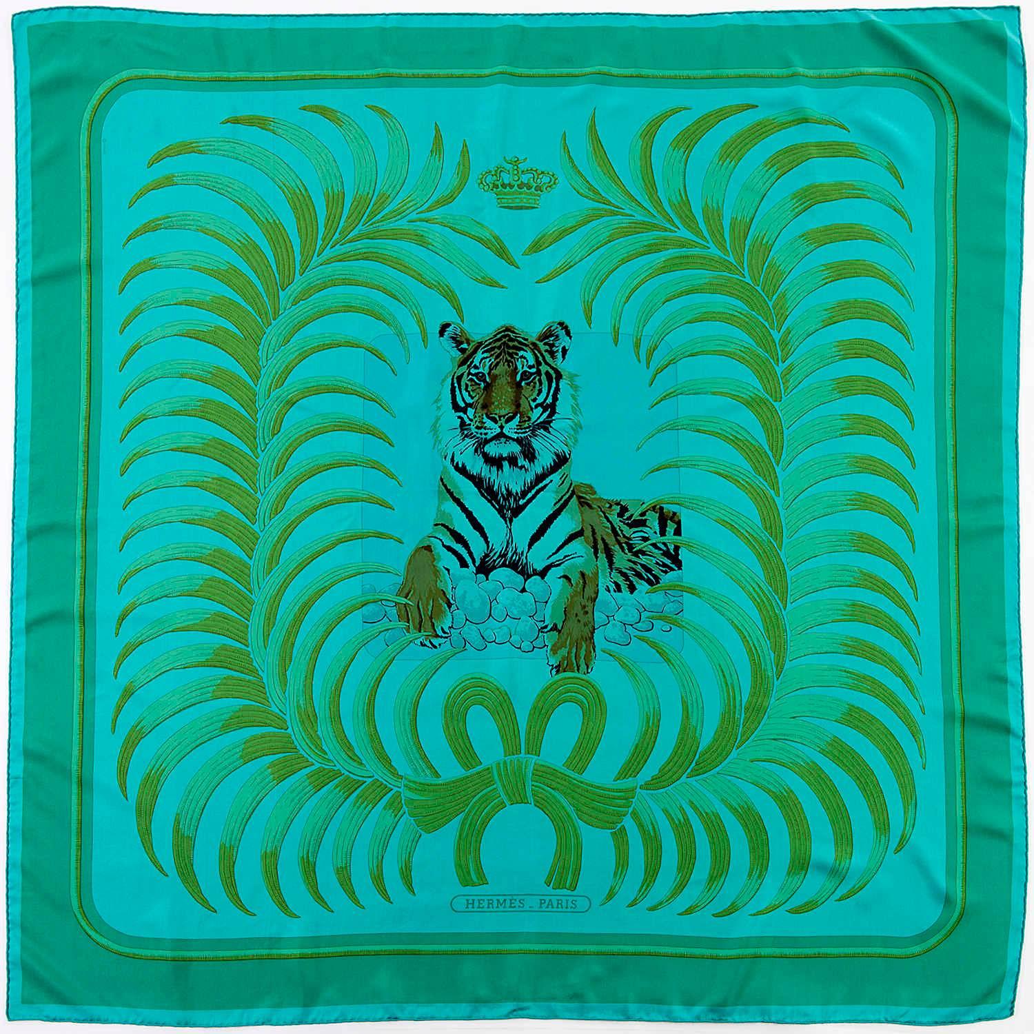 The original design for this beautiful Hermes Silk Shawl, was by Christiane Vauzelles in 1977. 'Tigre Royale' is a rare, much sought-after piece, now unavailable to buy in Hermes Stores. Finished with green tints on a turquoise green ground,