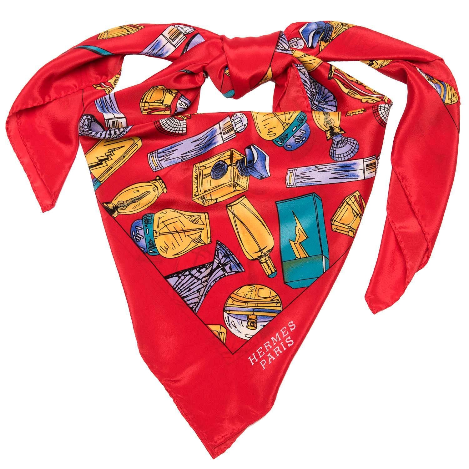A superb Hermes Silk Scarf, multi-coloured with a red border, decorated with perfume bottles of all different shapes & sizes to create this delightful scarf. In excellent condition, with no tears, holes, marks or odours.