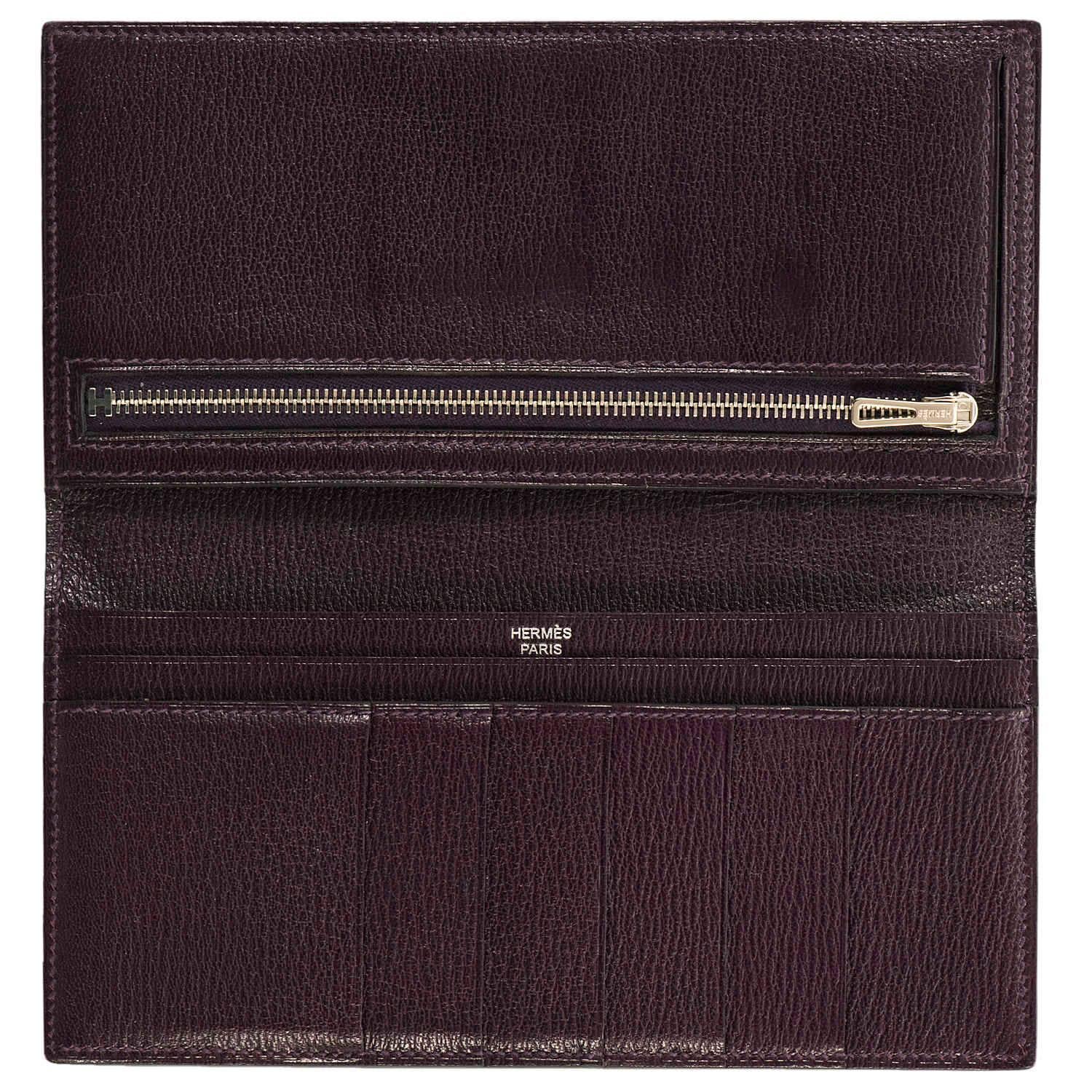 A very rare Hermes 'Amethyst' Shiny Crocodile Alligator Bearn Wallet in absolutely pristine, 'As-new' condition. The Crocodile Alligator is beautifully accented with Palladium silver hardware, with the inside finished in matching chèvre leather,
