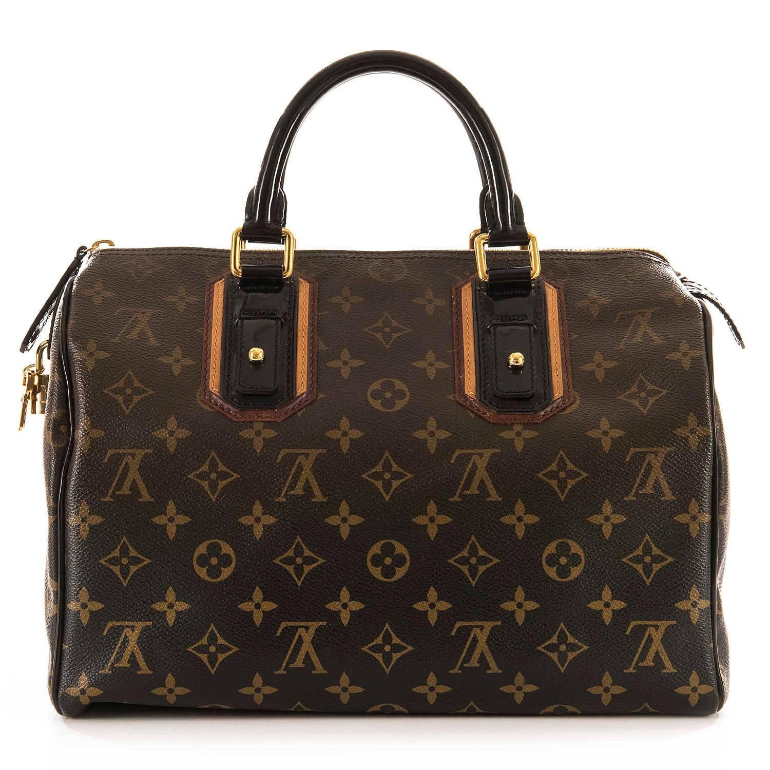 A completely 'Store-fresh' Rare Limited Edition Louis Vuitton 'Sac Mirage' Speedy 30cm. This fabulous bag is finished in a graded LV monogram Toile, trimmed with Tan and Natural leather, accented with Black Patent leather, complemented with Gold