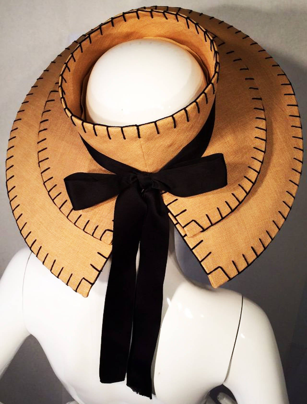 A fine and rare vintage Chanel haute couture hat. Authentic item custom ordered directly from Chanel 1990 haute couture location at 31 rue Cambon, Paris via Maison Michel Paris Milliners. Finest grade woven straw item features a open crown and