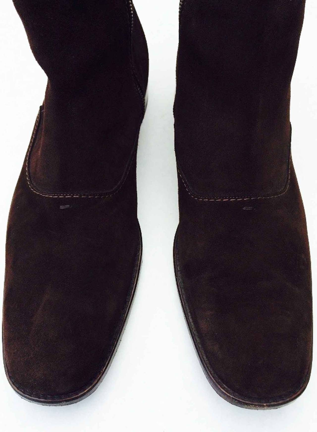 A fine pair Louis Vuitton suede ankle boots. Hard to source gents size 12. Items feature brown suede uppers, leather soles and 1