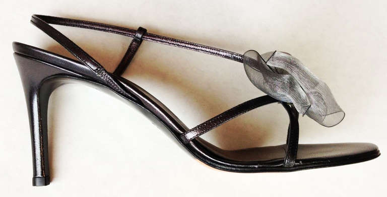 A fine vintage pair Yves Saint Laurent high heeled sandals. US size 7.5. Pristine and previously unworn. No box.