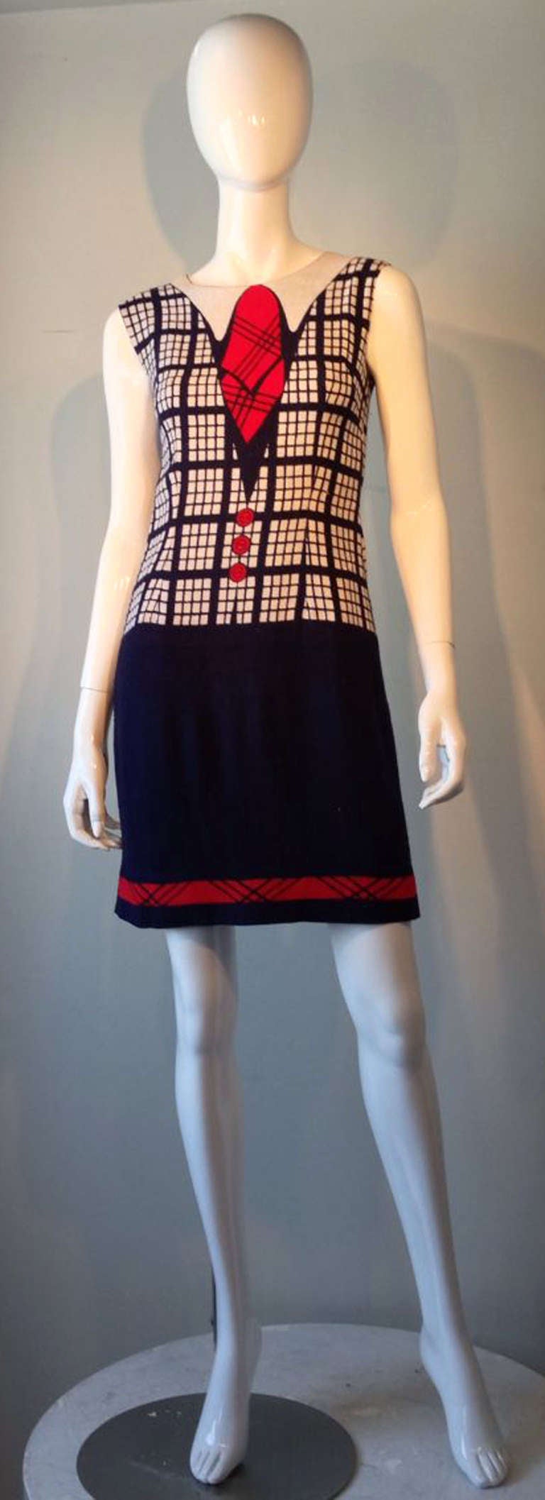 A fine vintage Modelor mod trompe-l'oeil printed dress. Charming red, white and blue printed raw linen weave item fully lined and zips up back.