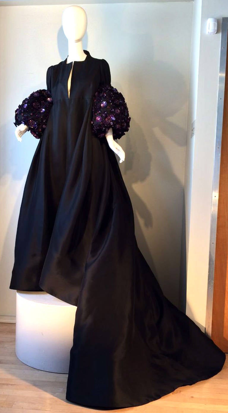 A exquisite Zang Toi entrance/opera coat for the F/W 2010 couture runway. Sculpted jet black silk gazar fabric item features precision seams and 