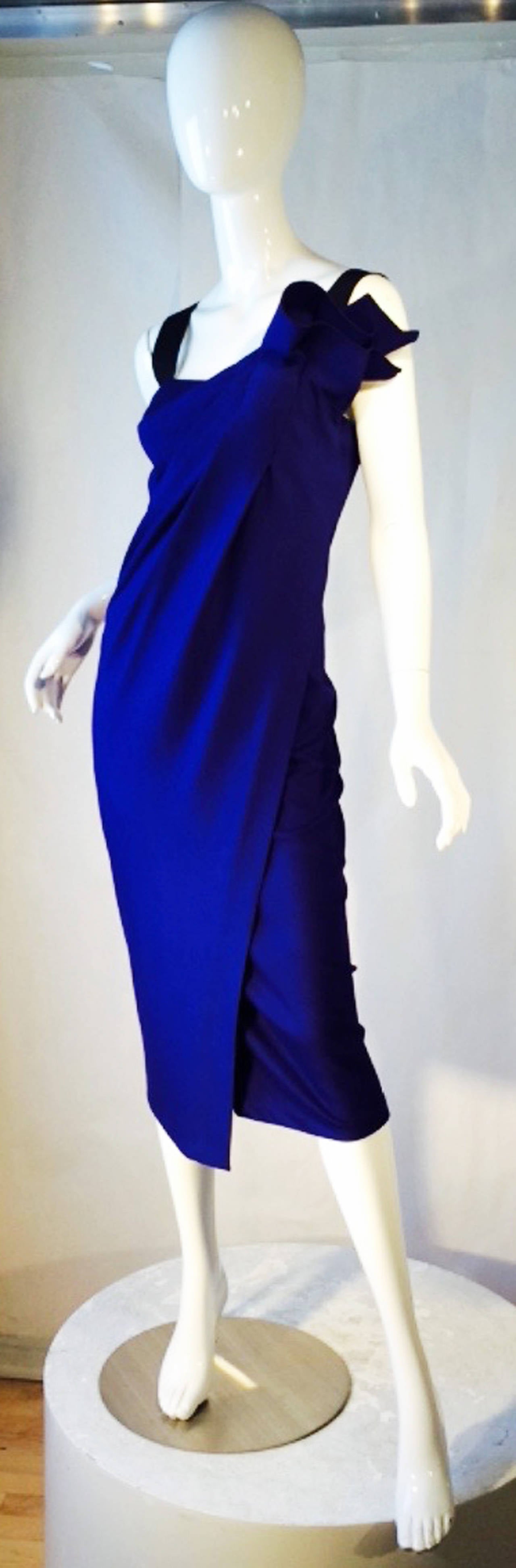 A fine and rare vintage Donna Karan runway sample body conscience /cocktail dress. Authentic Item labeled 