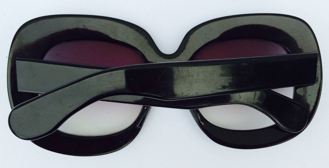 A fine vintage pair oversize Lucite sunglasses. Thick signed HL Purdy polished black frames with original tinted lenses. Excellent condition (no issues).