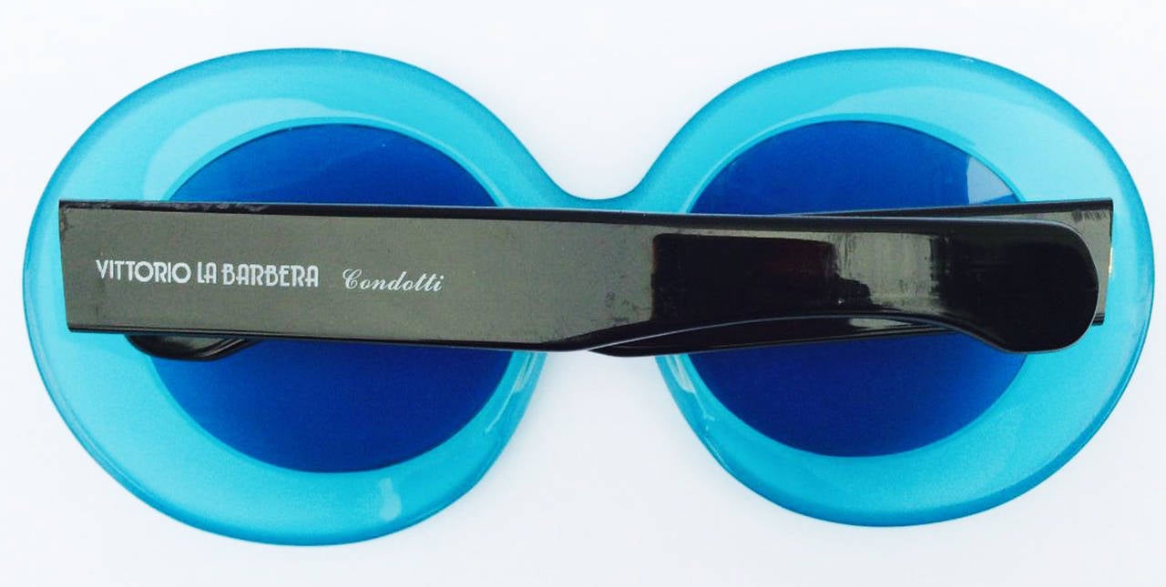 A fine vintage pair Vittorio La Barbera oversize Lucite sunglasses. Thick signed opaque turquoise polished frames with original tinted lenses. Original signature case intact. Excellent condition (no issues).