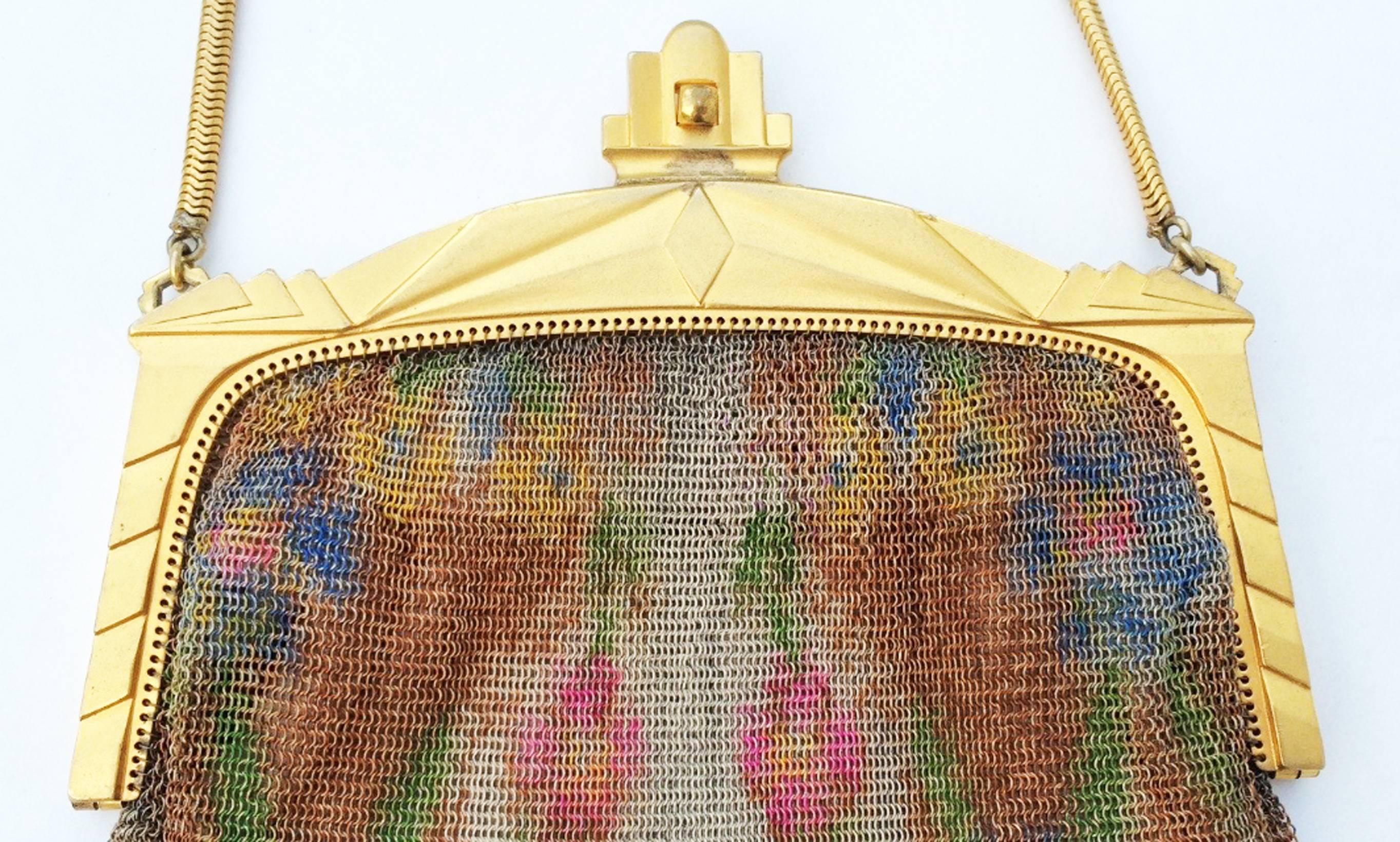 A fine and rare Paul Poiret Art Deco mesh hand bag. Authentic period Whiting & Davis item features a sculpted Art Deco gilt metal frame and hand painted 