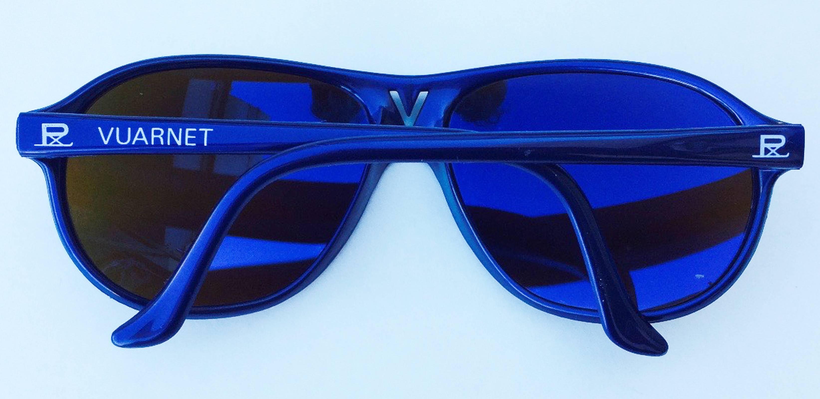 A fine vintage pair Vuarnet Skilynx-Acier ski sunglasses. Authentic blue vinyl frame item made in France. Original tinted lenses and signature case intact. Excellent with no issues.