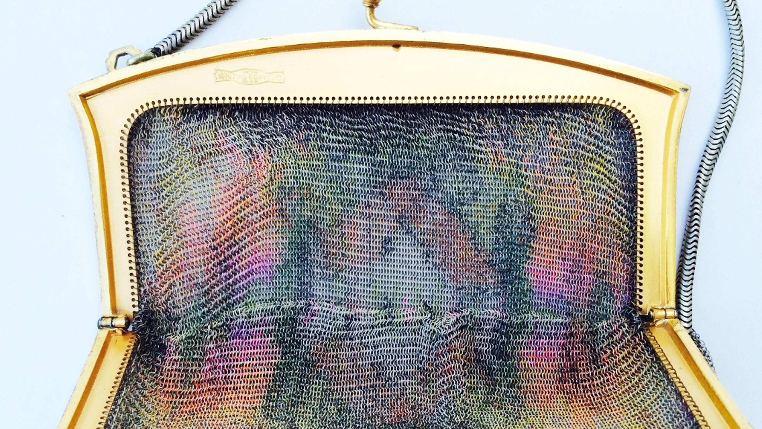 A fine and rare Paul Poiret Art Deco mesh hand bag. Authentic period Whiting & Davis item features a sculpted Art Deco gilt metal frame and hand painted 