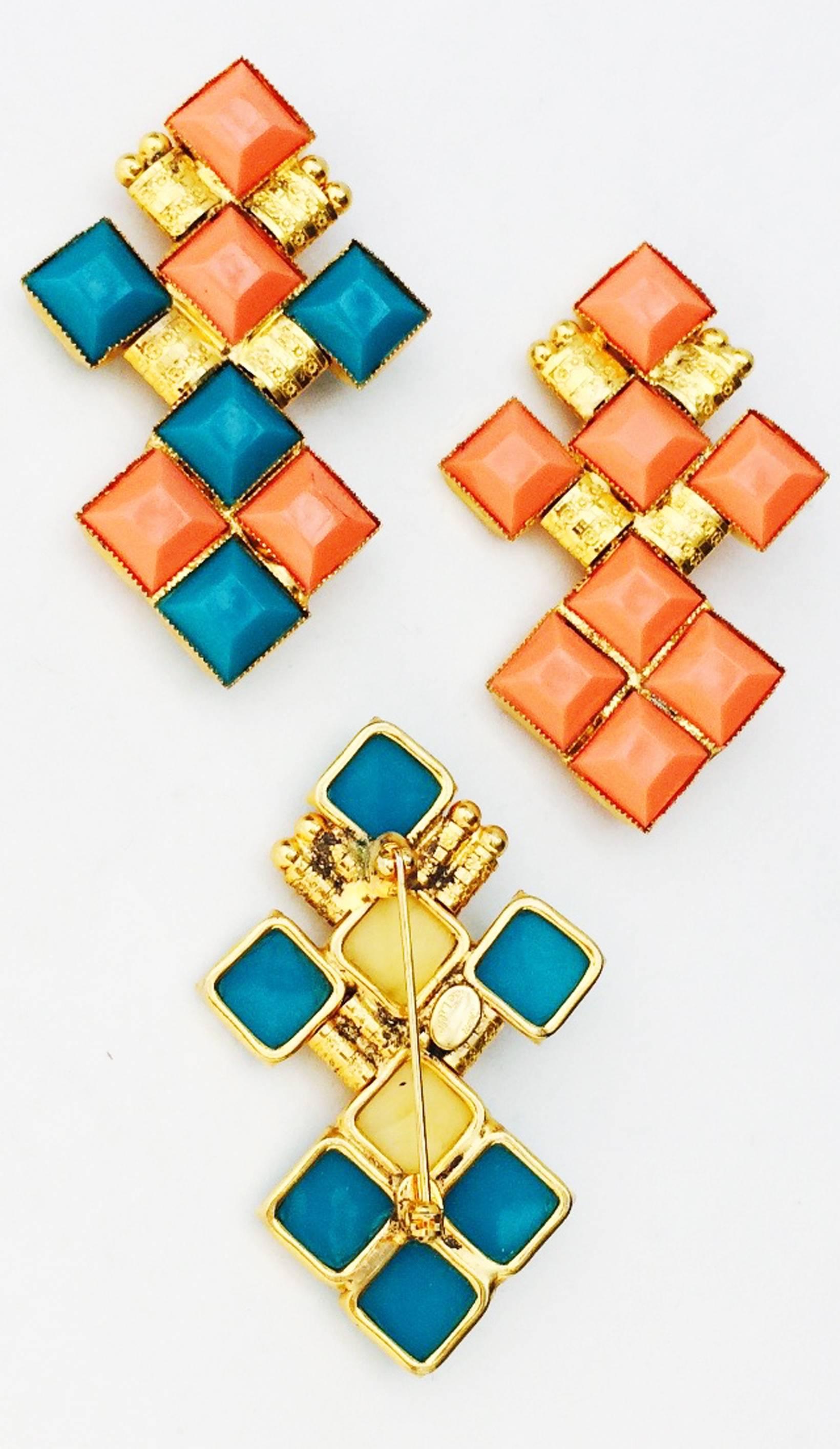 A fine and rare vintage William de Lillo for Nina Ricci brooch trio. Three matching signed gilt metal items produced For Nina Ricci haute couture and feature various colored plastic 