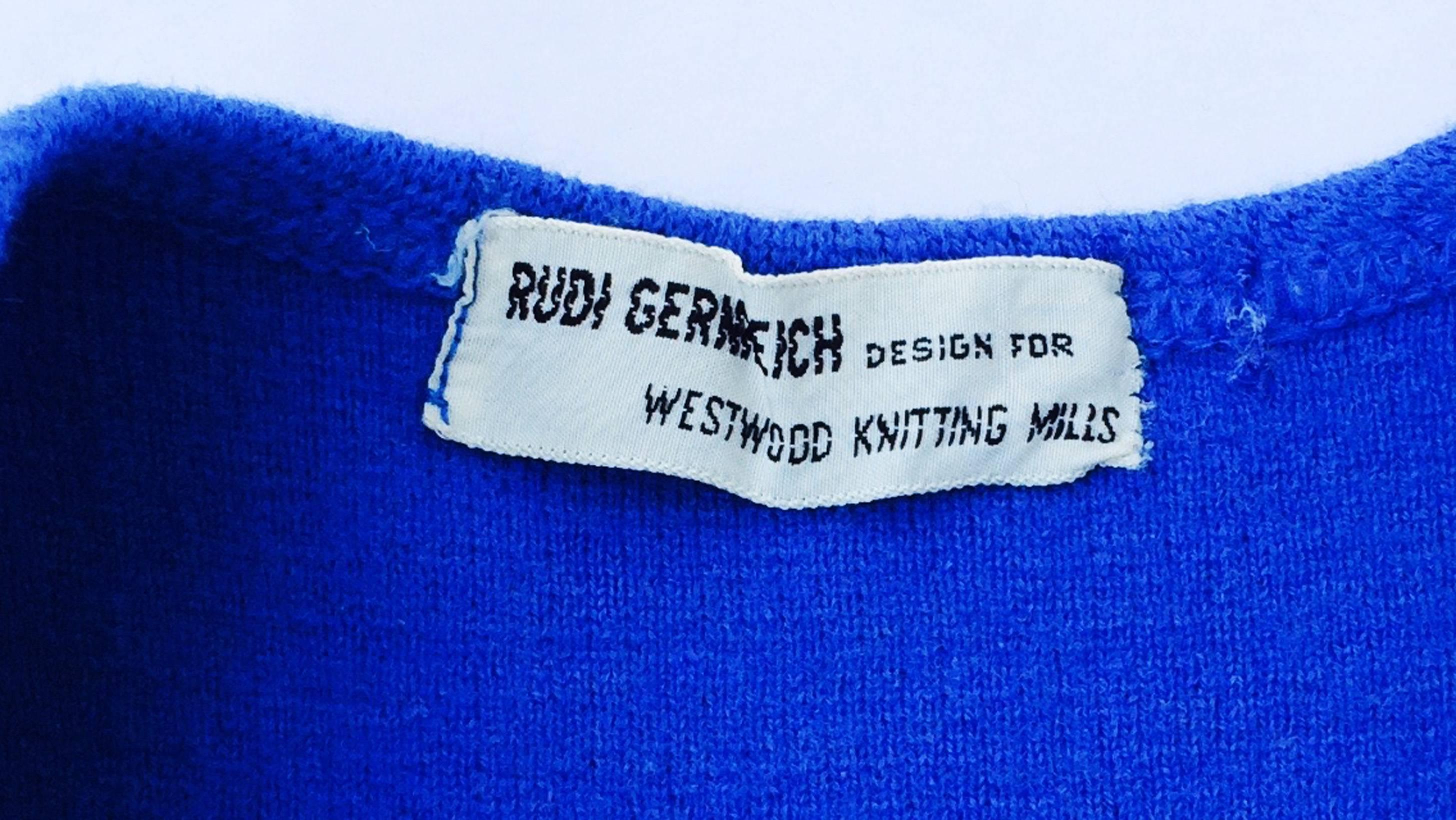 A fine and rare vintage Rudi Gernreich maillot swimsuit. Blue wool knit fabric item features large contrasting mother of pearl decorative button front. A rare survivor in excellent condition.