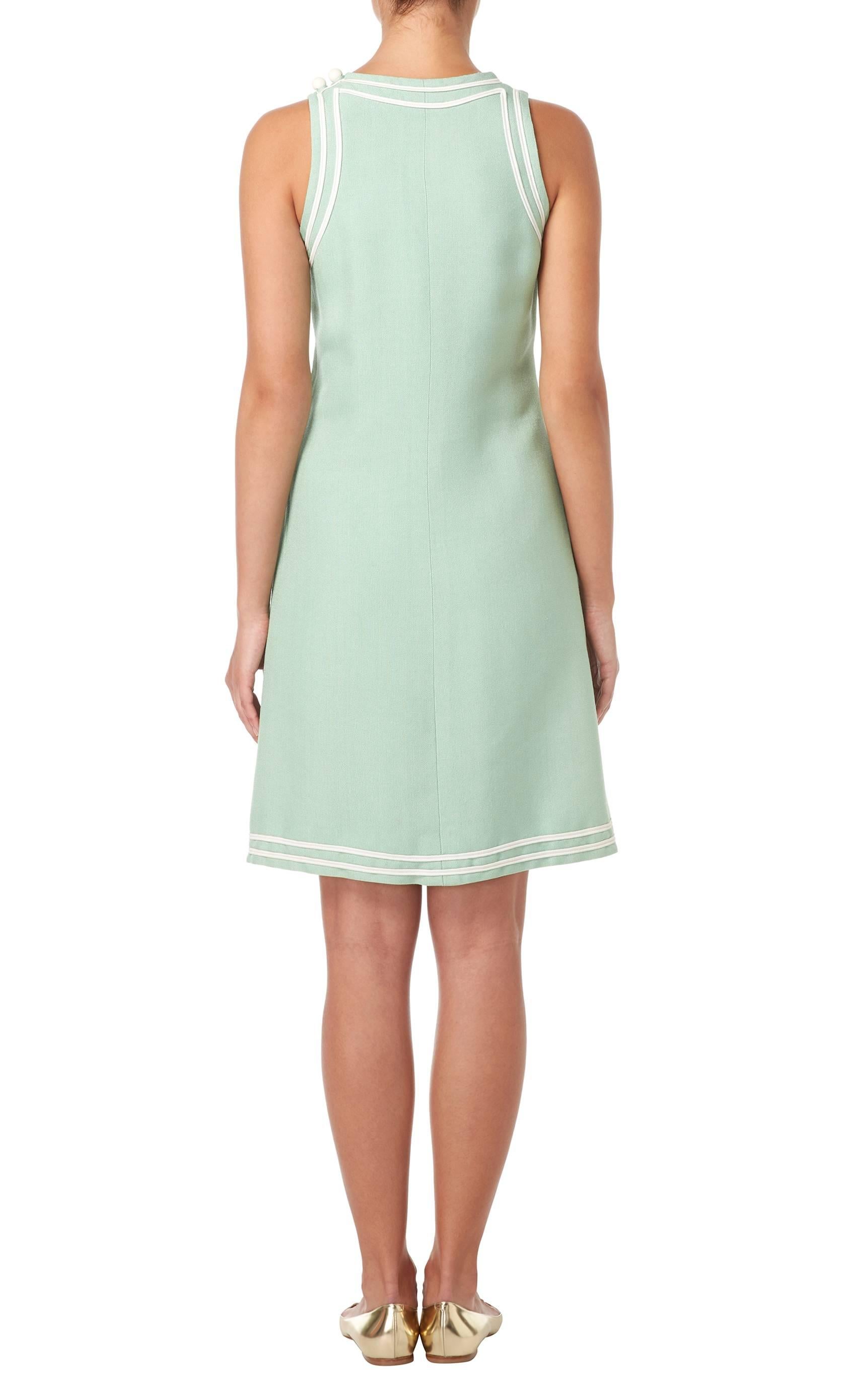 ensemble comprising tunic and pair of shorts