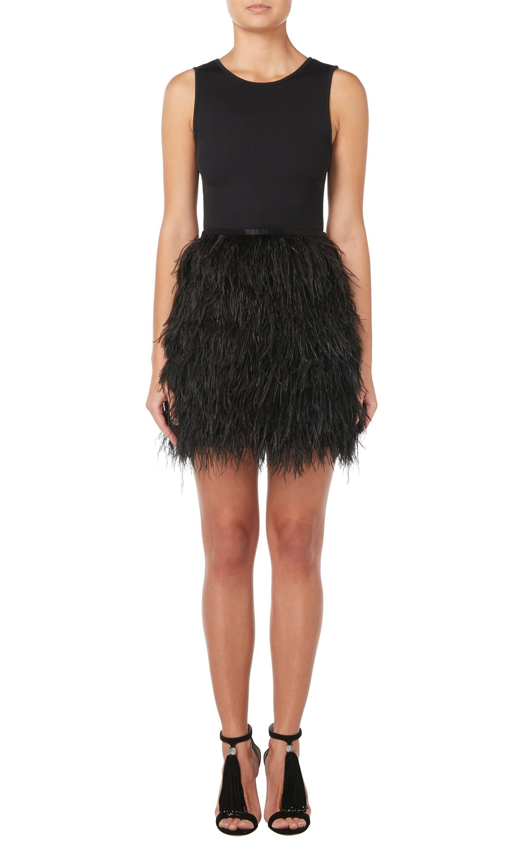 Constructed in black ostrich feathers
Black satin waistband
Zip fastening to the side
Excellent condition with the original label, lining and fastenings
Professionally dry cleaned and ozone-treated
Inspected by a couture-trained seamstress
All