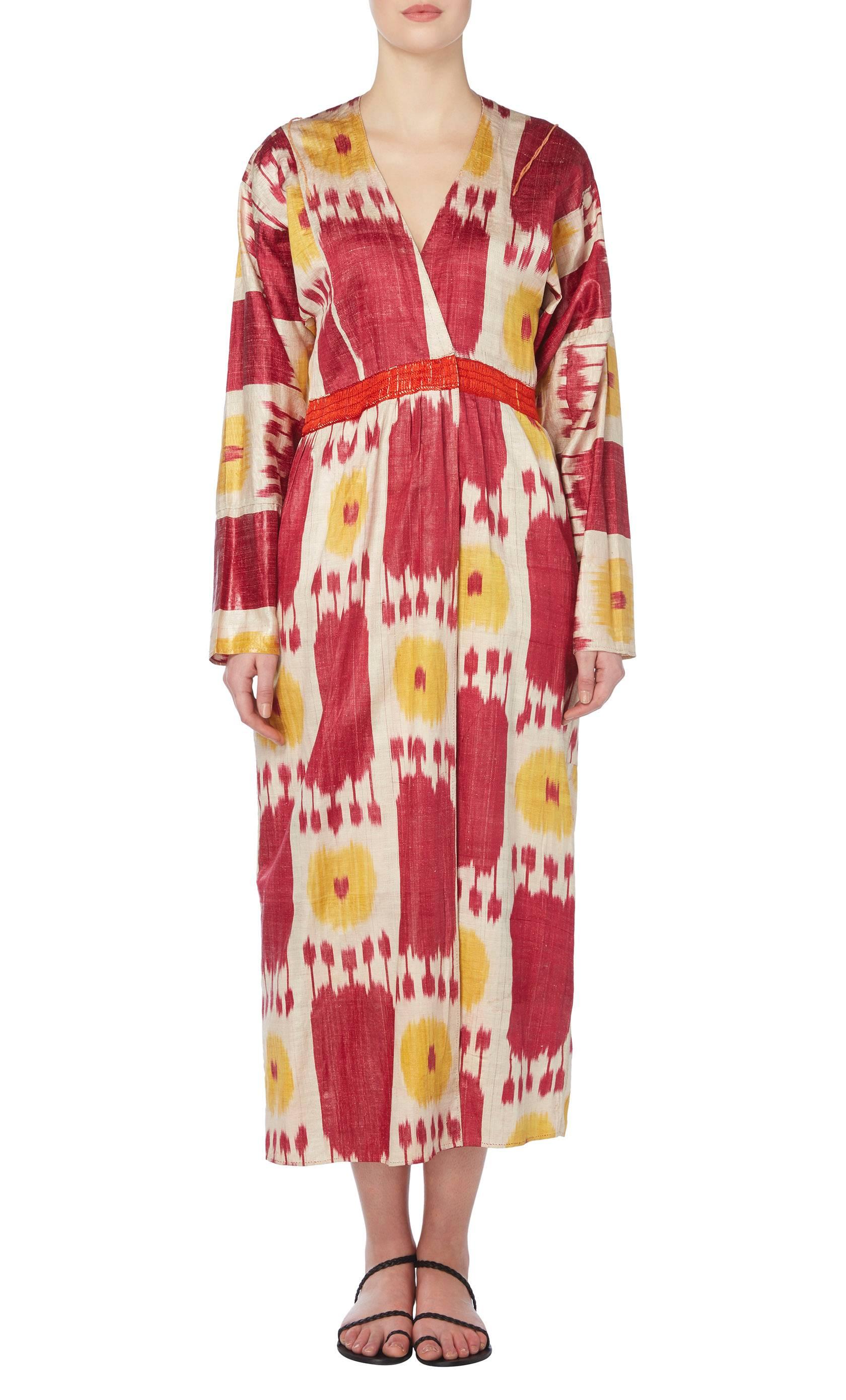 Constructed in deep red and yellow ikat print silk
Featuring hand-finished stitching
No fastenings
Professionally dry cleaned and ozone-treated
Inspected by a couture-trained seamstress
All vintage items have been previously worn, gentle signs