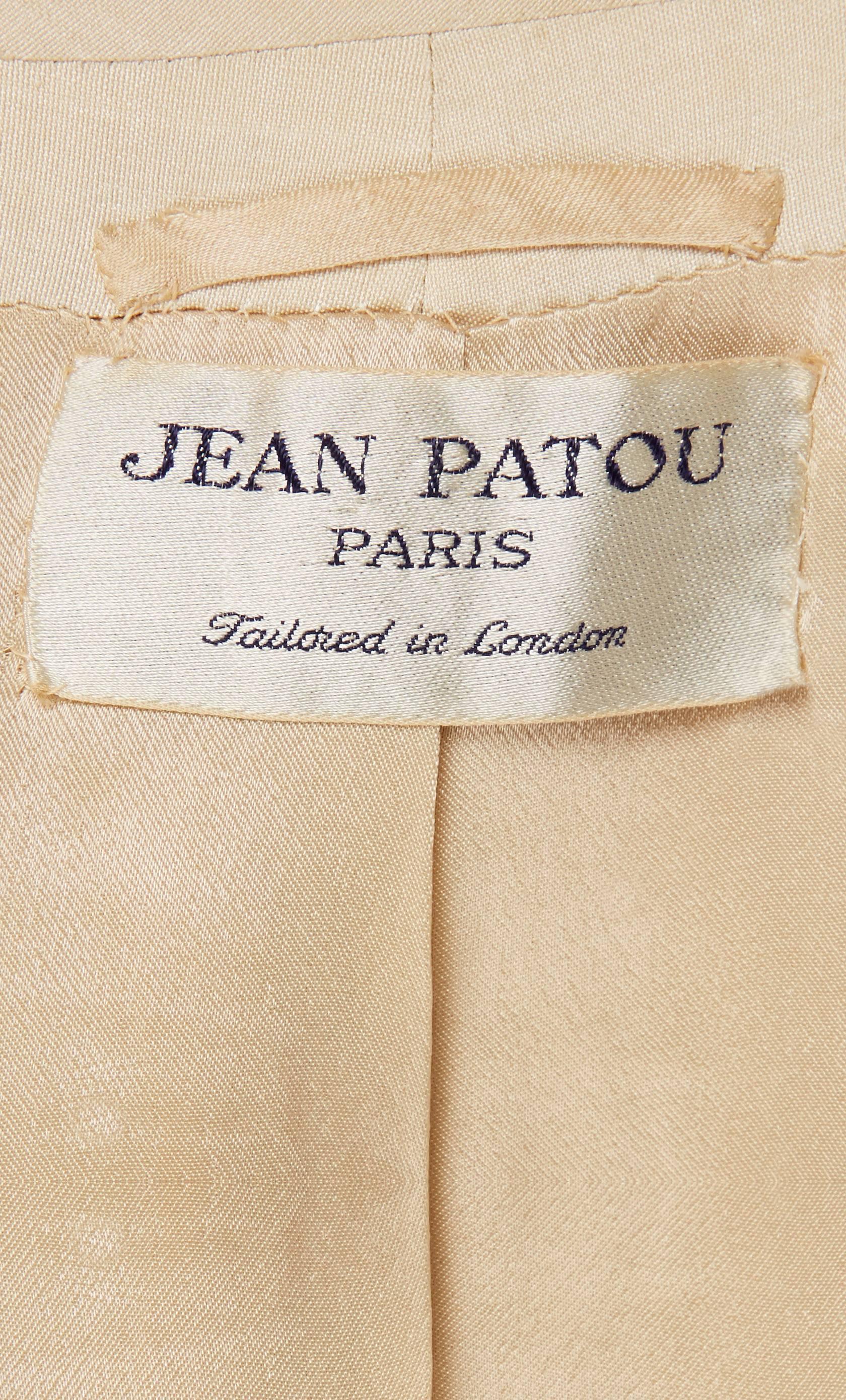Women's Jean Patou beige skirt suit, circa 1964