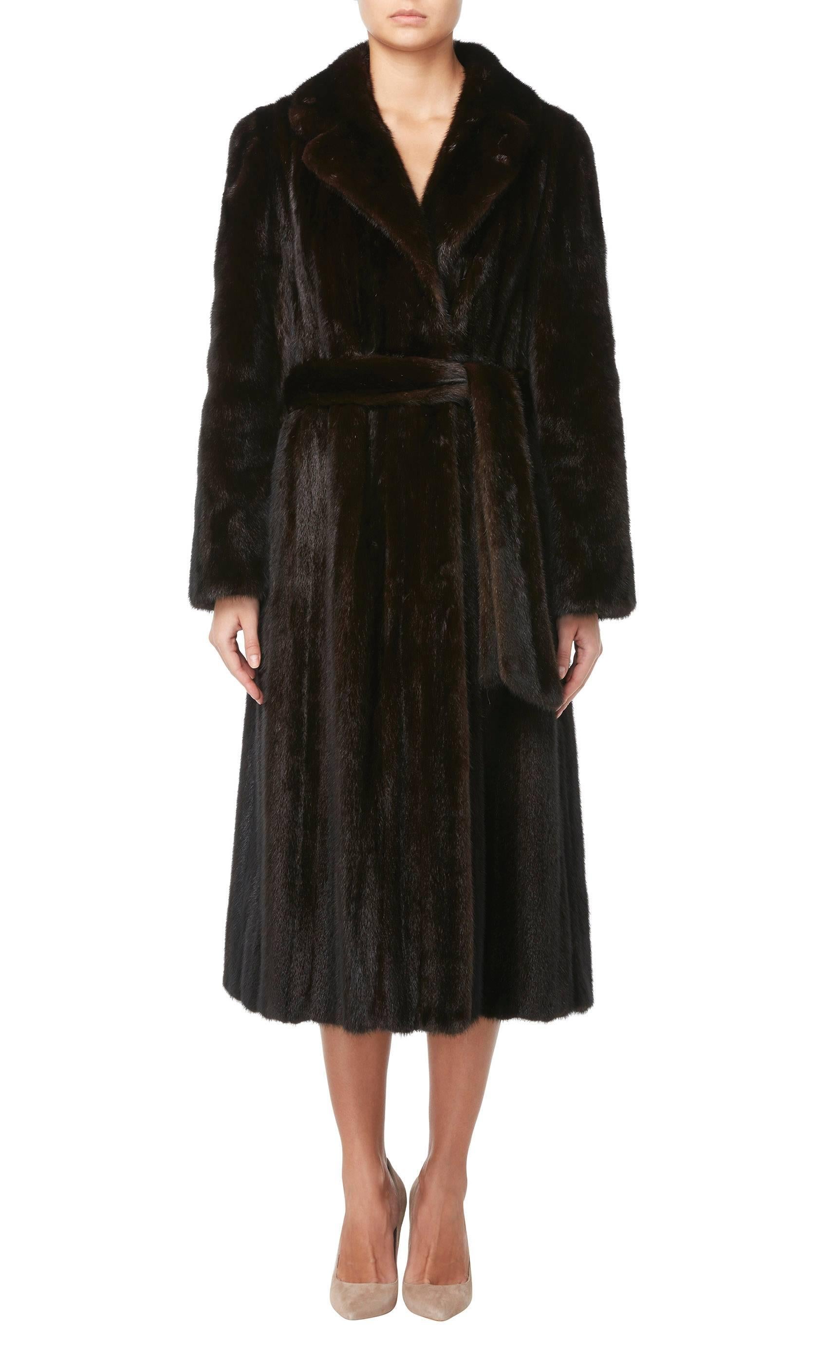 This stunning Gainsborough coat in soft brown mink is the perfect choice for cold winter days. With a double lapel collar and inside pockets on the hip, this coat will be a chic option for day or night. A separate belt in matching fur can be worn to