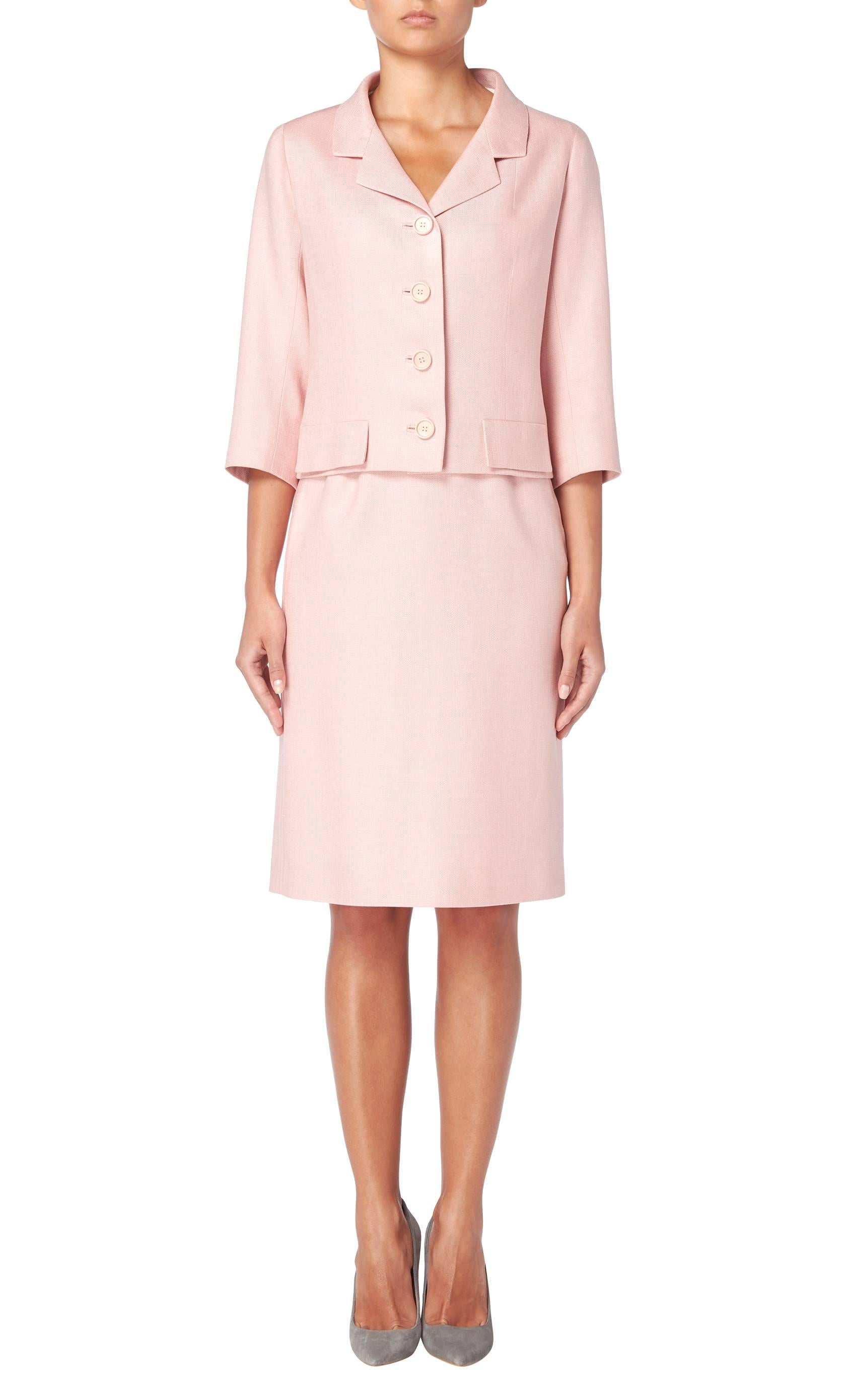 A fantastic example of how Cristobal Balenciaga’s tailoring remains incredibly contemporary, this skirt suit designed for his Eisa label will fit seamlessly into a modern wardrobe. Comprising of a jacket with three-quarter length sleeves and