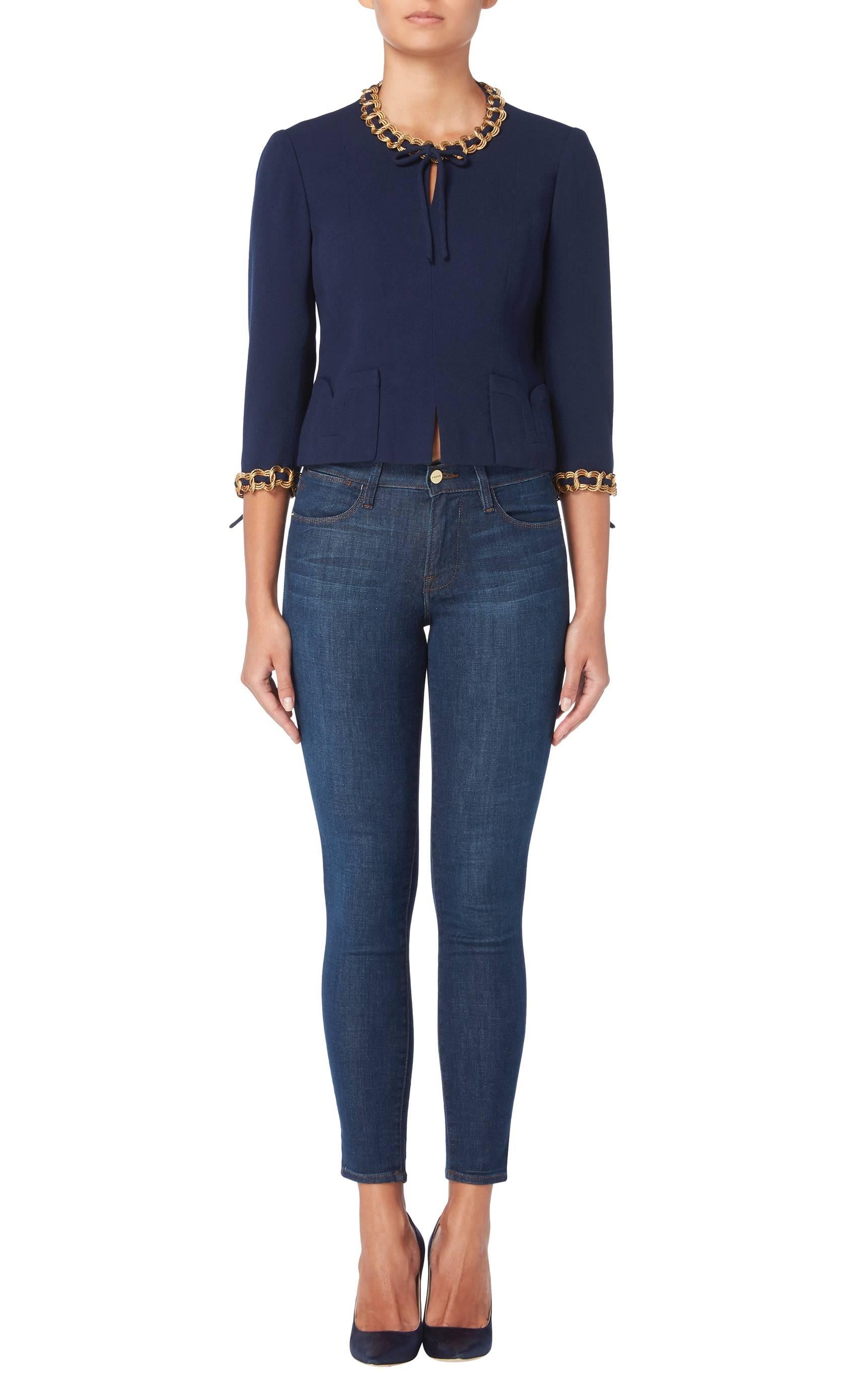 The perfect way to introduce vintage haute couture into a contemporary wardrobe, this Chanel navy top is easy to wear and incredibly chic! Constructed in navy moss crepe, the top has three-quarter length sleeves and outside pockets on the waist. A