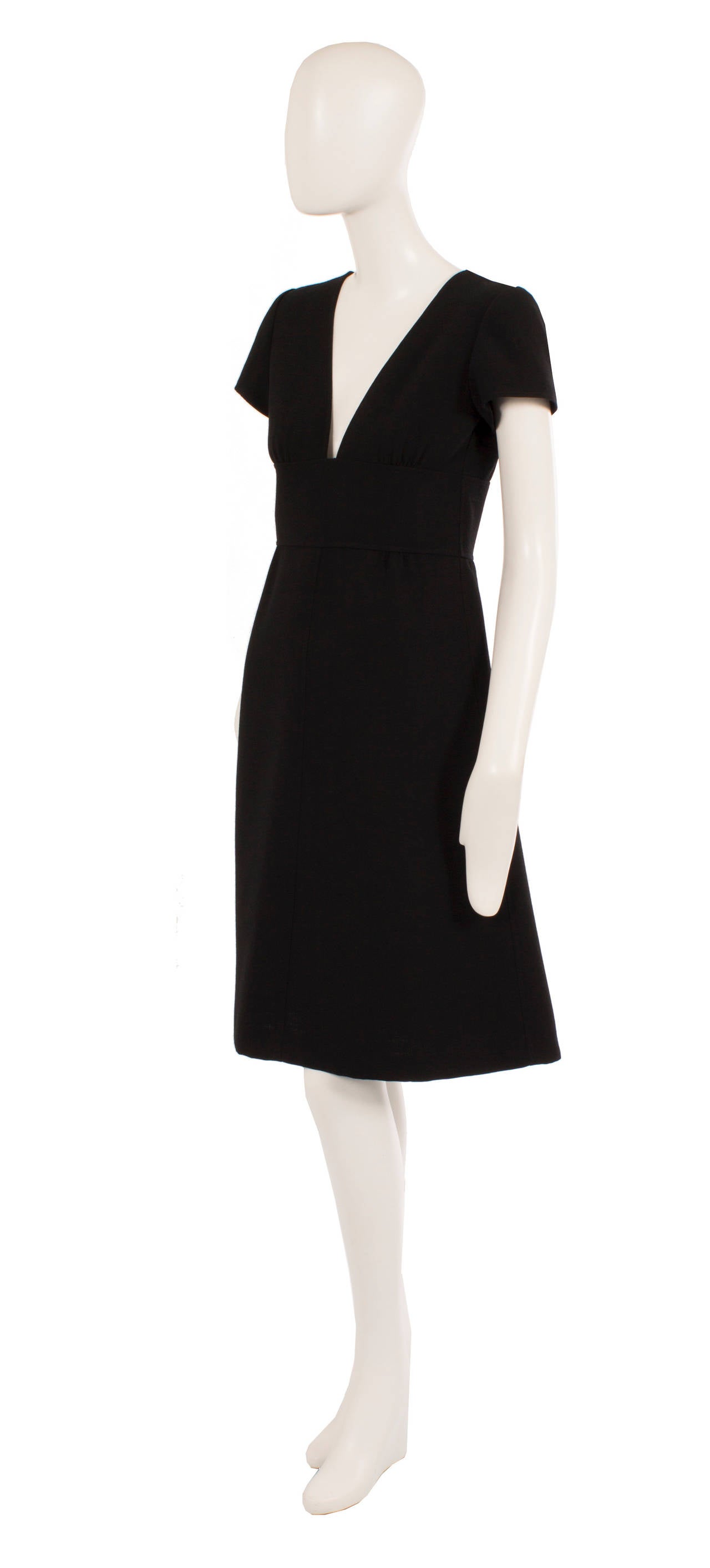 This classic little black dress by Courrèges Couture Future is an amazingly contemporary piece. The capped sleeves and A-line silhouette make it a great option for daytime, while the plunging neckline reveals just the right amount of décolletage