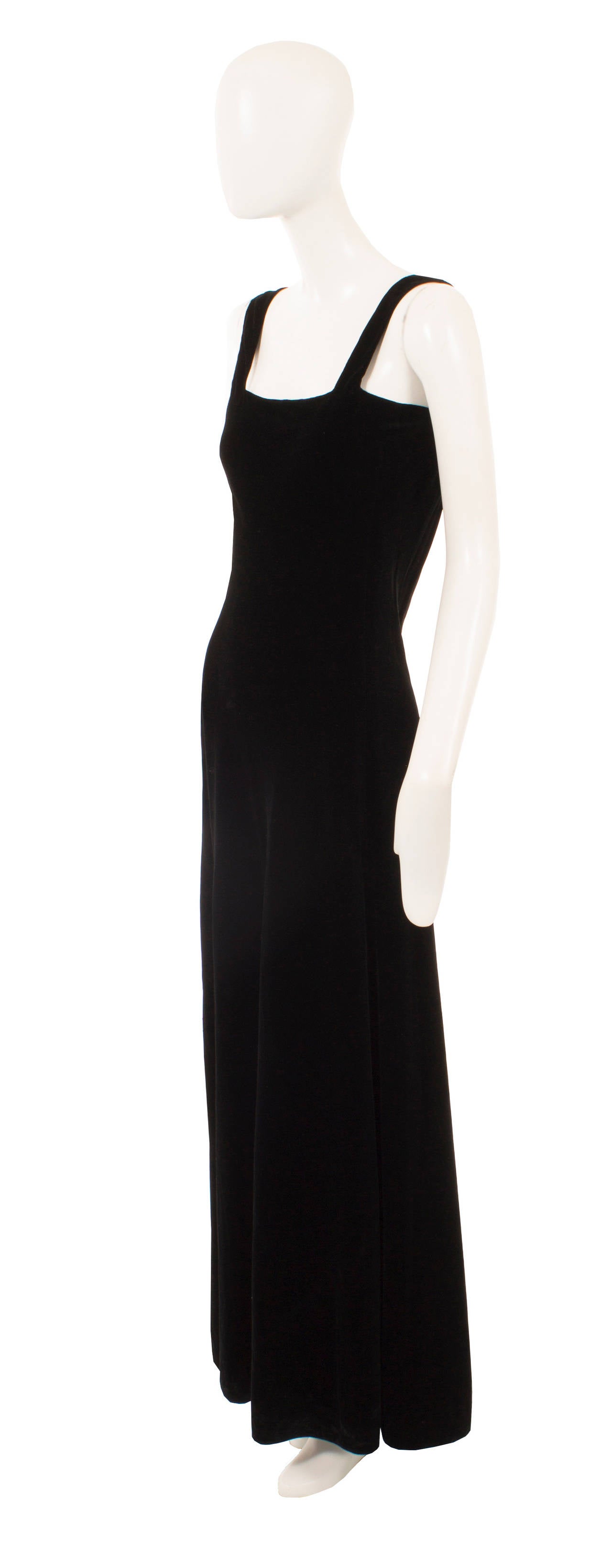 The epitome of chic, this dress is an exquisite example of Lanvin haute couture and looks as contemporary today as it did in 1933. Constructed in sumptuous black velvet and cut on the bias for an incredibly flattering silhouette, the dress falls