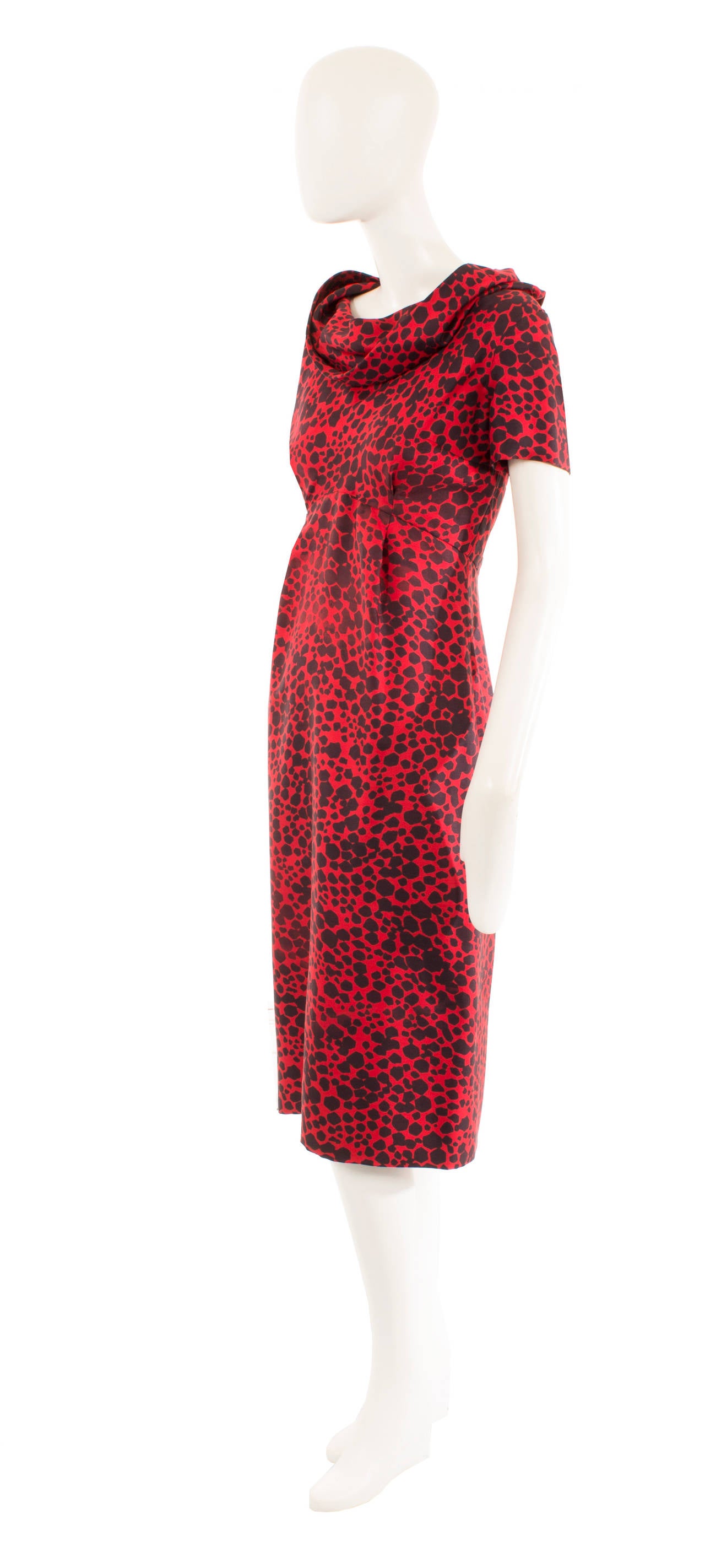 The perfect way of introducing vintage into a modern wardrobe, this dress was designed while Antonio Castillo was head designer at the house of Lanvin. Highly contemporary, this dress would make a bold and colourful option for the office or