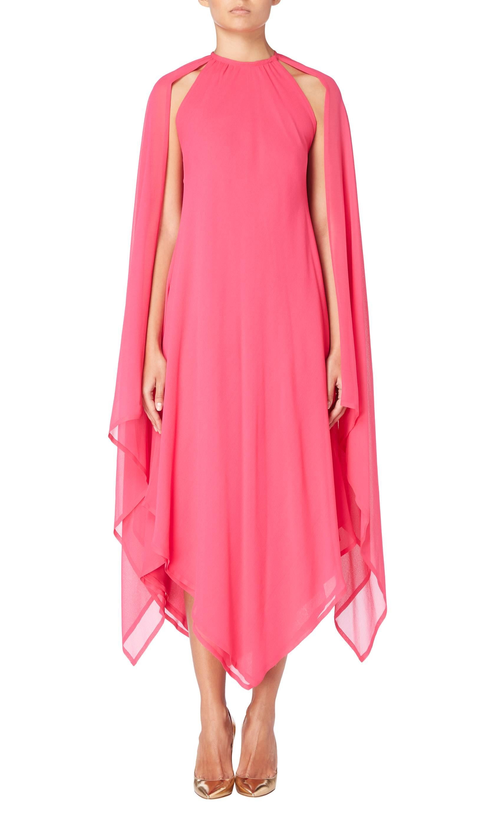 Add a pop of colour to an evening event in this vibrant Lanvin haute couture dress. Constructed in layers of bright pink chiffon, the dress has a high neck and pointed hemlines giving an asymmetric silhouette. An additional layer of chiffon creates