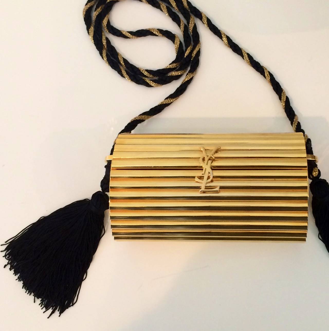 ysl gold clutch with tassel