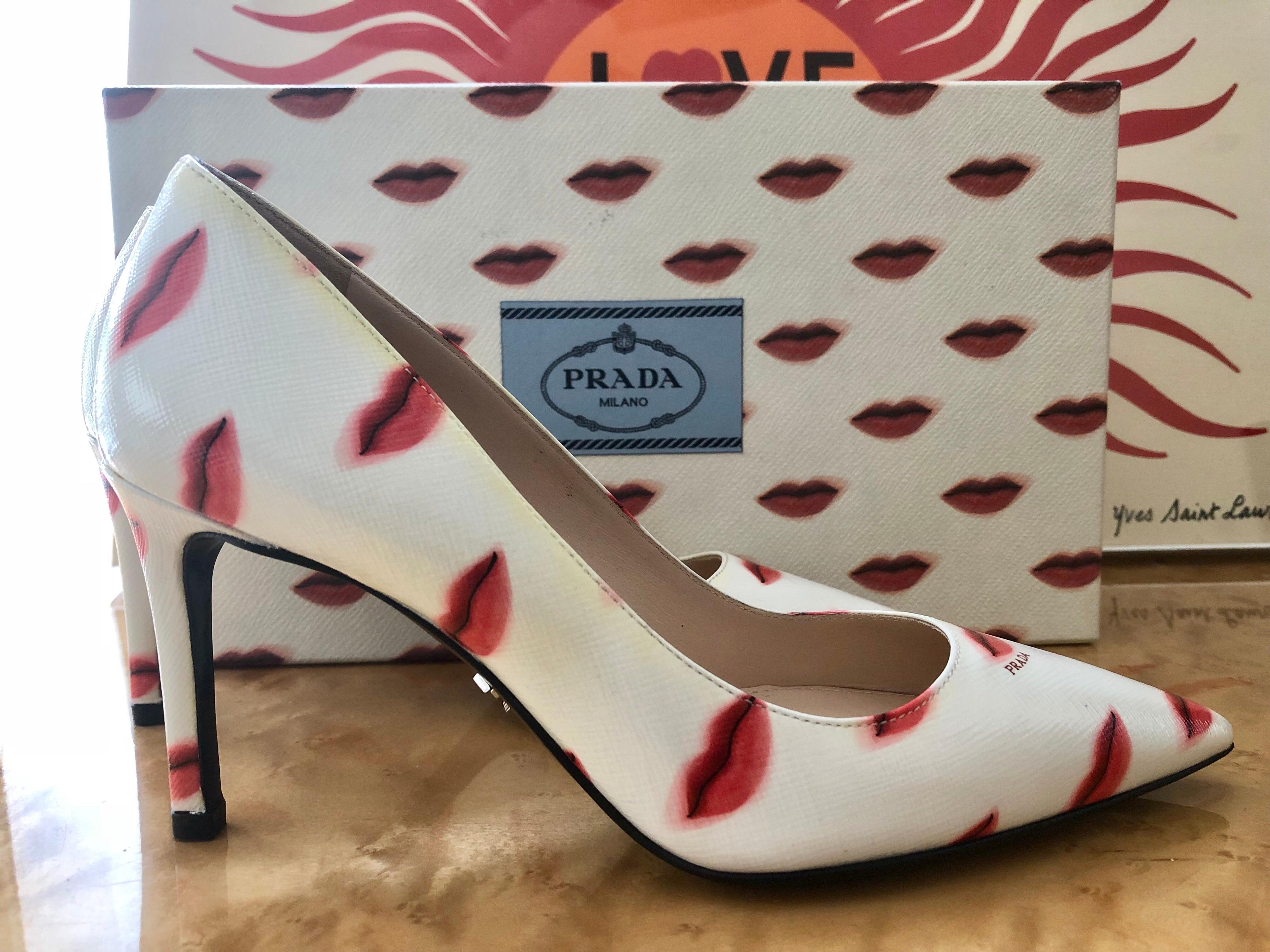 Iconic Prada lip print heels. 
Unworn, and comes with the collectable lip print shoe box. 
These shoes were special ordered at the Prada Made-To-Order Tour at Saks Fifth Avenue in 2016.

Size: 34.5 Italian, 4.5 U.S
Heels: 3 inches
Insole: about 9