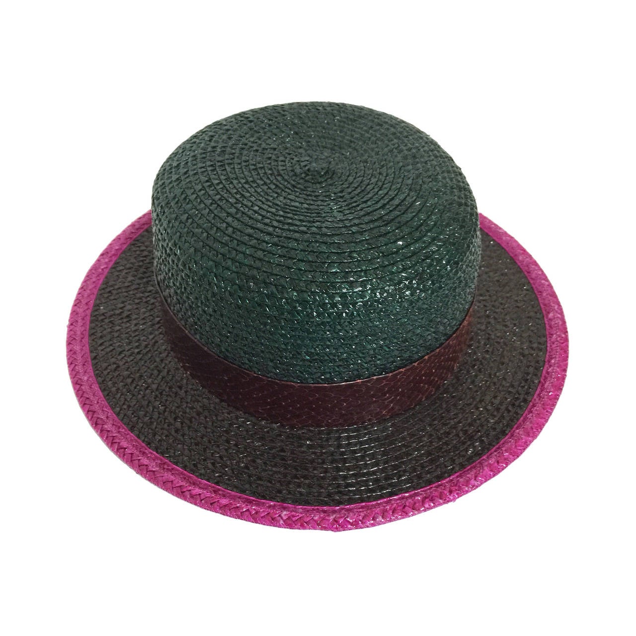 Vintage Yves Saint Laurent Runway Hat
Color blocked Glazed Raffia woven hat, trimmed with burgundy snakeskin.
Size: 57
Fits head size small to medium.
Excellent condition.