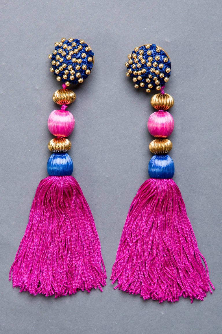 Huge Vintage YSL runway earrings from the spring/summer of 1991. 
Rare and iconic statement earrings, highly collectable
Fuchsia and teal tassel earrings. 
8 inches long
In amazing and pristine condition
These earrings are unsigned but