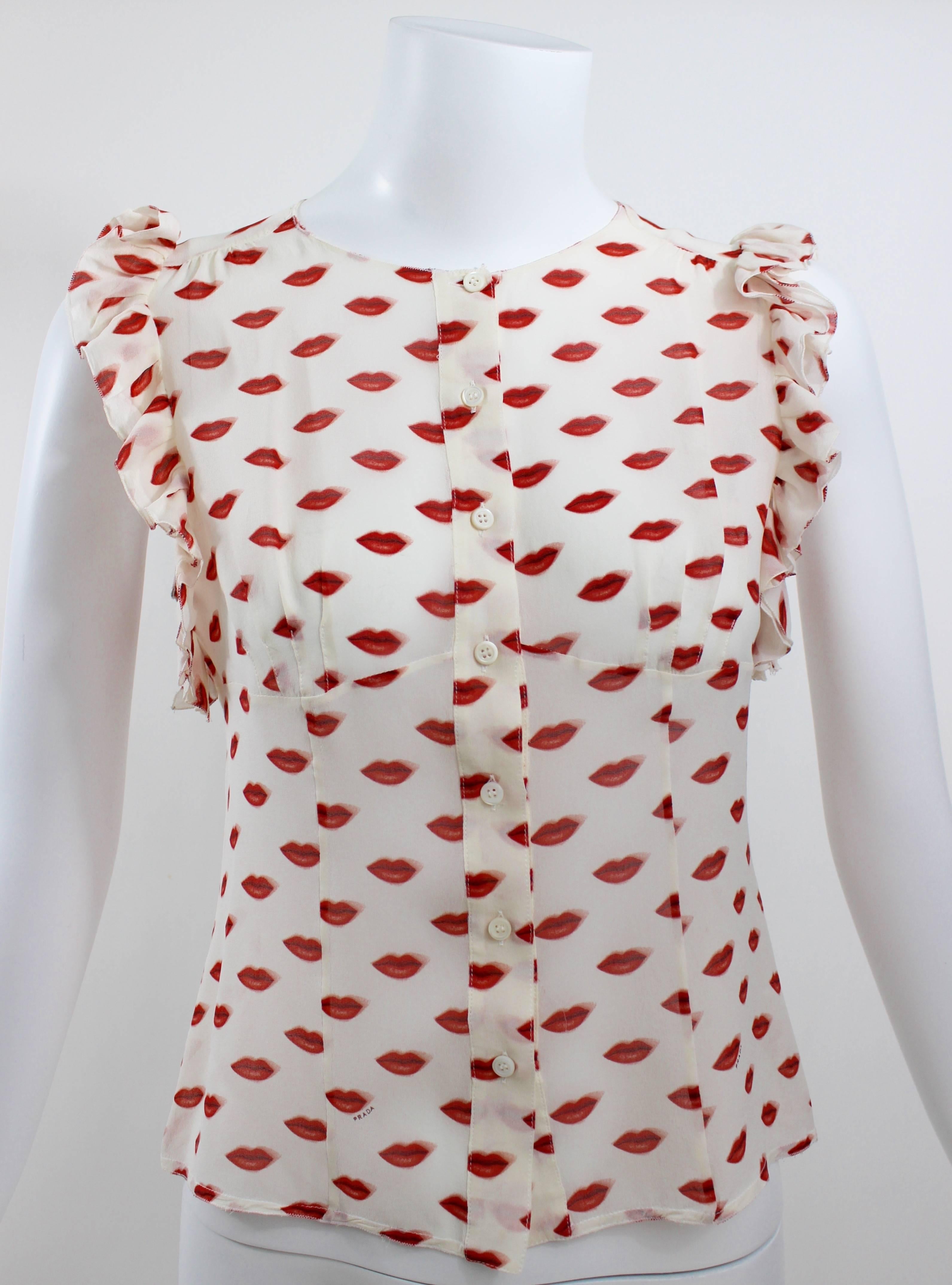 Iconic Prada lip print silk chiffon sleeveless blouse from 2012.
Excellent condition.
Size tag removed, please go according to measurements.
Photographed on a size 4 mannequin.

Measurements:
Bust: 34 inches
waist: 30 inches
length: 19.5