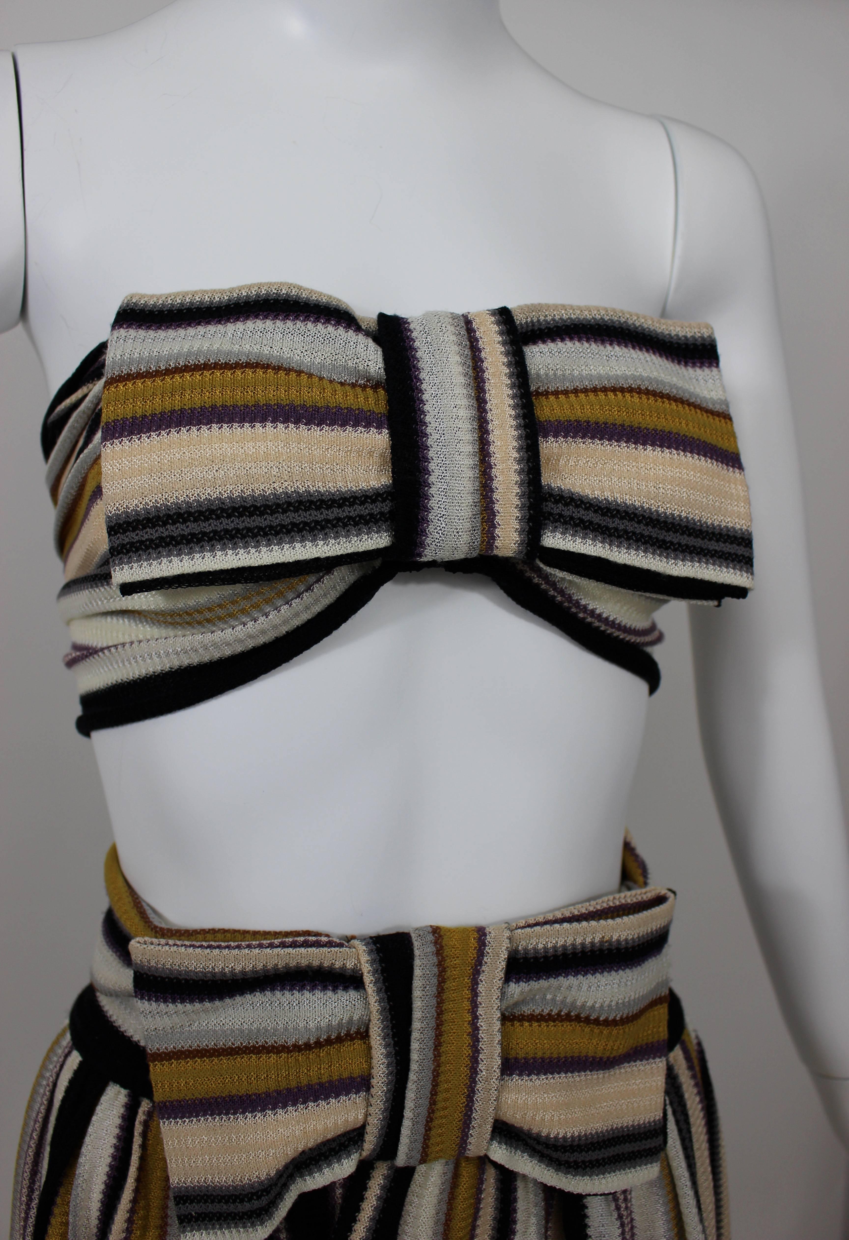 Missoni Bow top and matching skirt. In signature Missoni stripe print.

Size estimate: XS/S
Measurements:
Bandeau Top:
Bust: 32-34 inches
Skirt:
Waist: 25 inches
Hips: 34 inches 
Length: 23 Inches