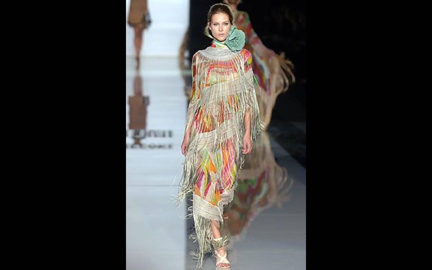 This dress ; a beautiful creation from Missoni, as seen on the runway.
I love the colorful abstract painted print on silk.
Long silk fringe panels. 

Size estimate: S 
Measurements: 
Bust: 32 -34 inches
Waist 30 inches
Hips: 32- 36 inches
Length: 54