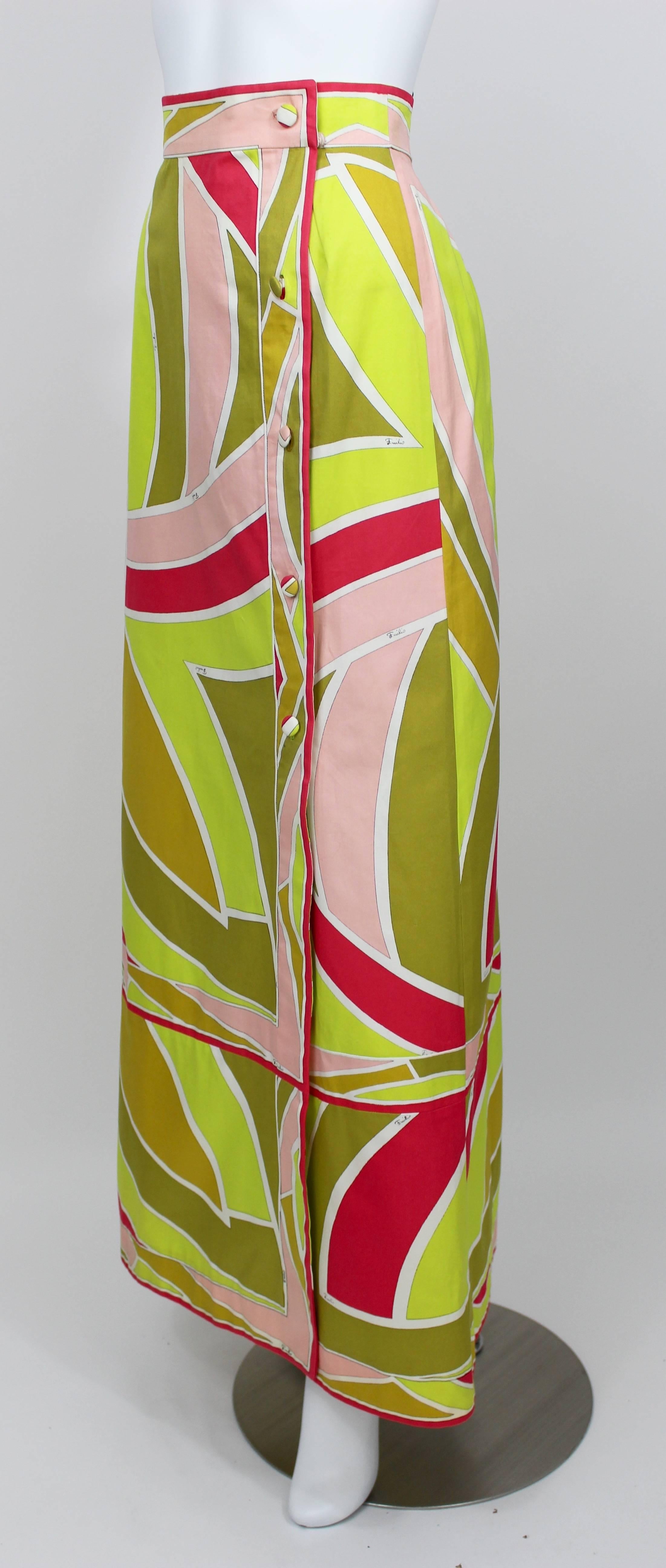 A fabulous Pucci printed cotton twill maxi maxi skirt. 
The cotton is crisp and the colors are vivid. 
The skirt has five Pucci fabric covered buttons down the side.
Excellent condition

Size estimate:S
Measurements: 
Waist: 26 inches
Hips: 36