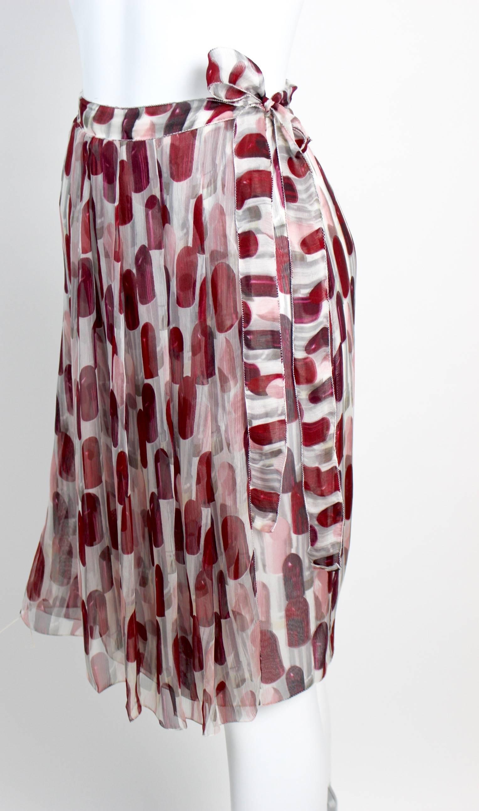 This is my third skirt from the Prada Spring 2000 collection that I am pleased to offer. Runway and ad campaign featured this print is now considered one of the fashion houses most iconic pieces. Fashioned from a light and airy silk chiffon  with