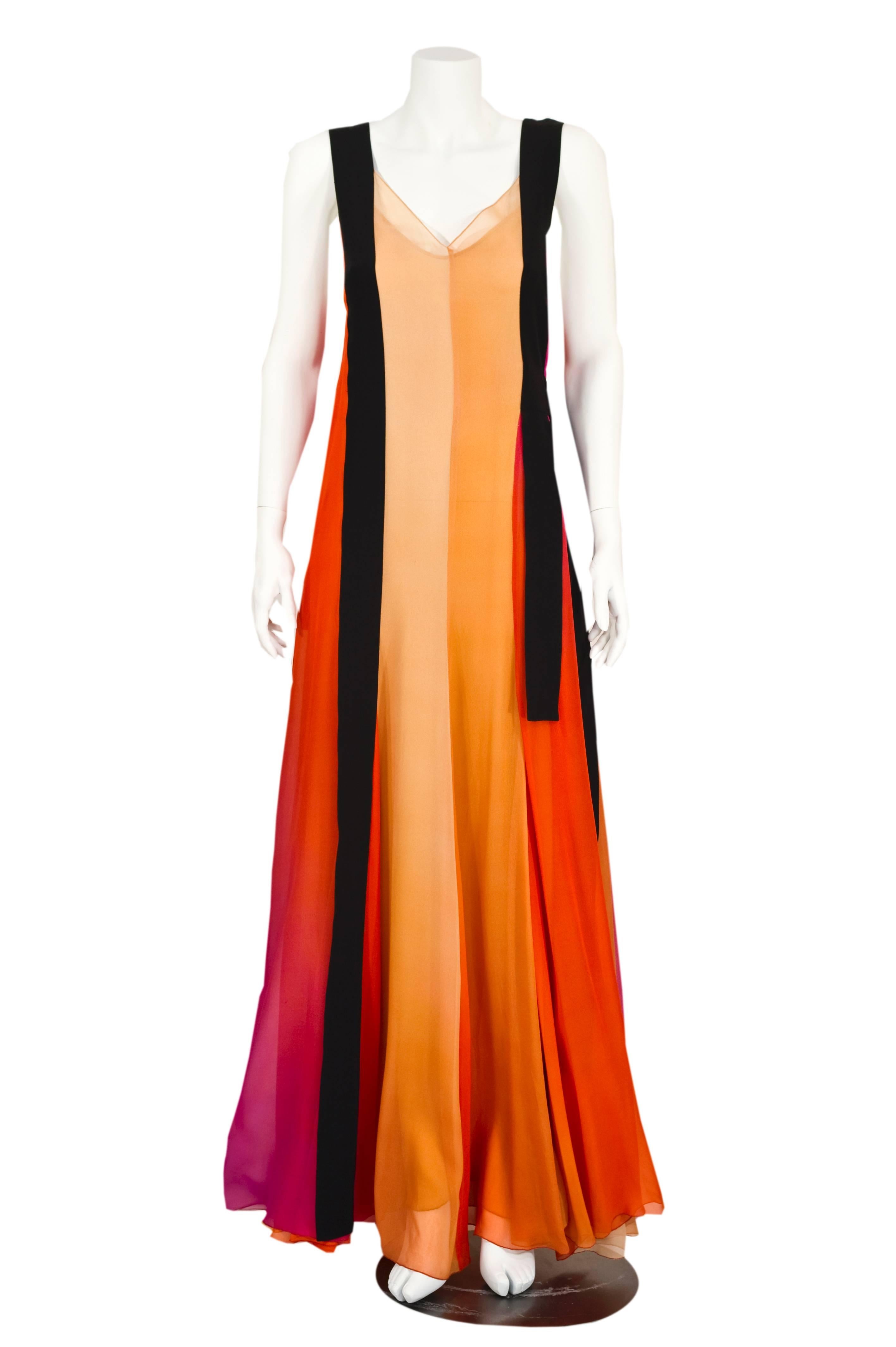 A stunning Sonia Rykiel  gown from spring 2012. Long flowing  color block ombre panels of  fine  silk chiffon in nudes, apricot, vibrant orange and magenta.   Black silk streamer shoulder straps float over the gown and off to the side. This