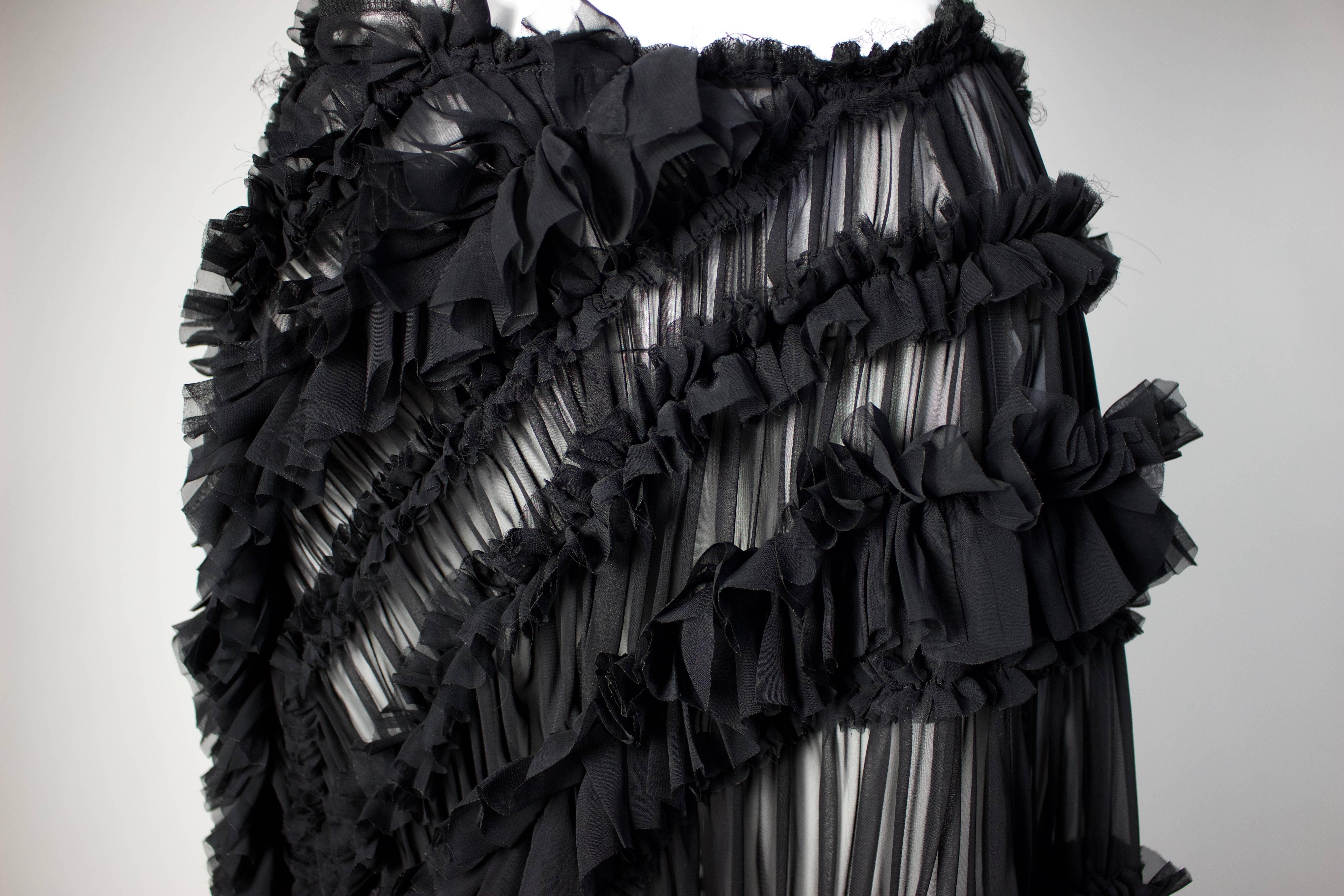 On the eve of the Metropolitan Museum of Art’s much-anticipated Rei Kawakubo retrospective comes this beautifully sublime skirt created by the Japanese designer. From her fall 2011 Comme des Garçons collection, the ruffled confection perfectly