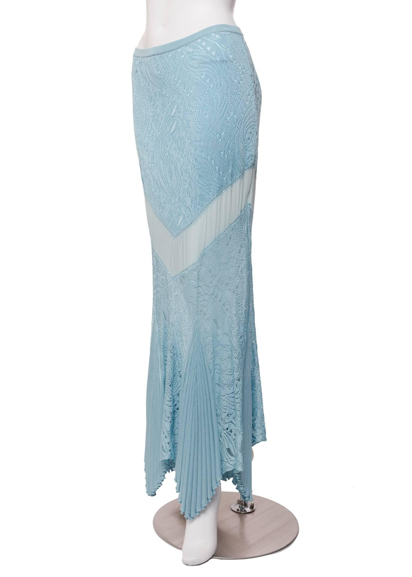 This powder blue skirt is an exquisite reminder of how John Galliano reveled in the theatricality of dressing while he was at Christian Dior. Featuring a stunning mermaid hem that is inset with pleats that fan out along the bottom, it could have