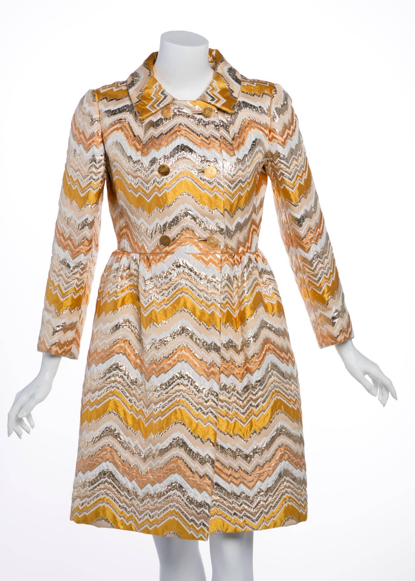 This magnificent metallic coat dress dates back to the Sixties, when an up-and-coming Bill Blass was still designing for Maurice Rentner, the decades-old American label he would eventually buy and make his own. Classic and glamorous, it is an early