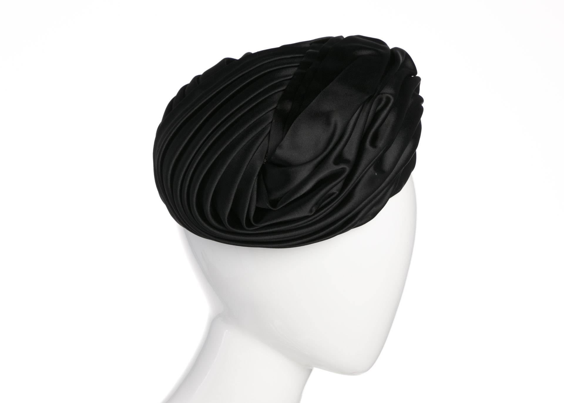 Turban style hats have been incorporated into western fashion since British aesthetes began questioning restrictive dress during the 19th century. During the mid-20th century, everyone from Queen Elizabeth to Audrey Hepburn wore variations on this