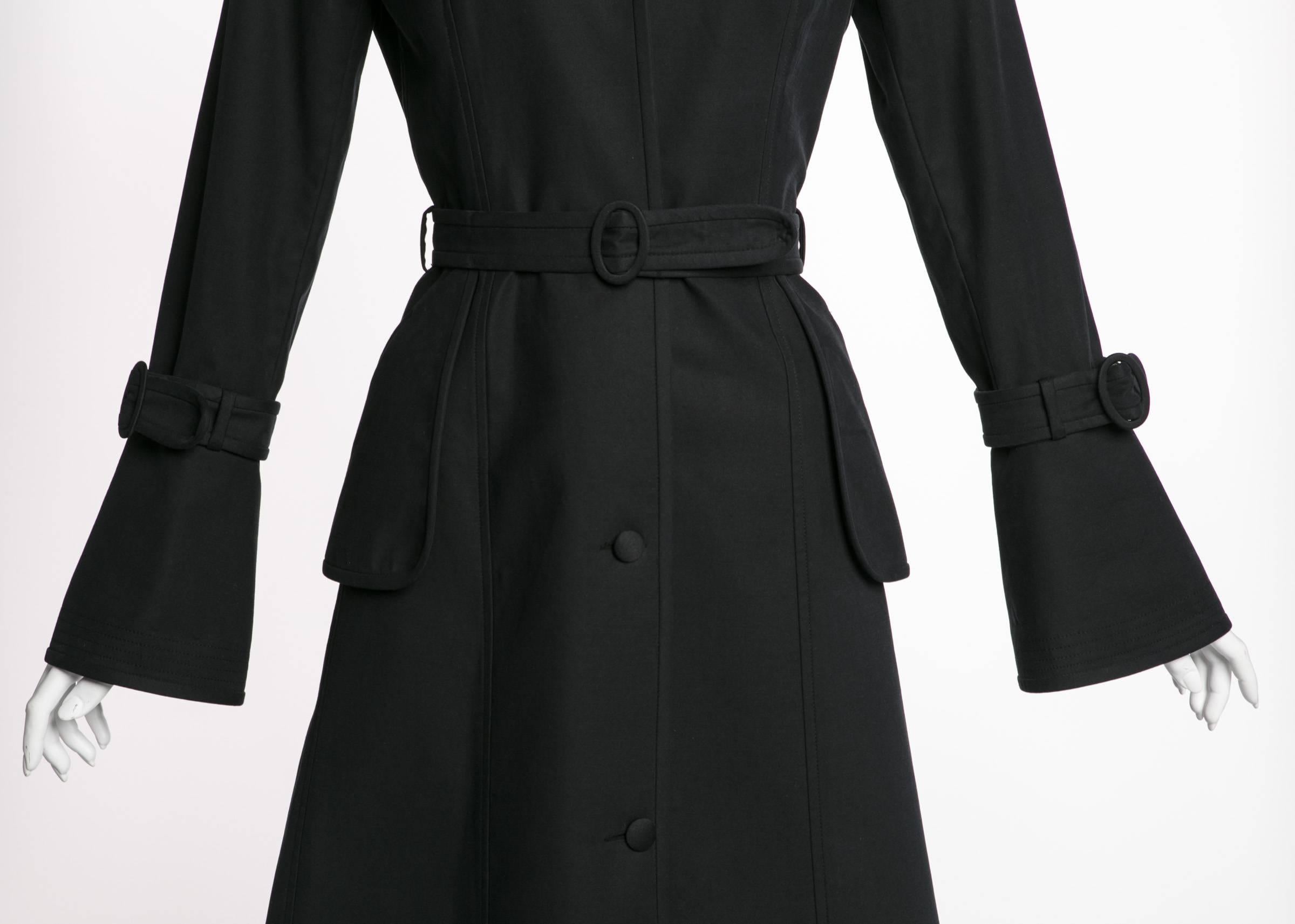 A black trench is both seductive and classic. This beautiful version by Martin Grant has subtle femininity and embodies a WWD article that calls his work “…perfect fare for an Audrey Hepburn type,” (8 Oct 2004). Indeed, the Australian born designer
