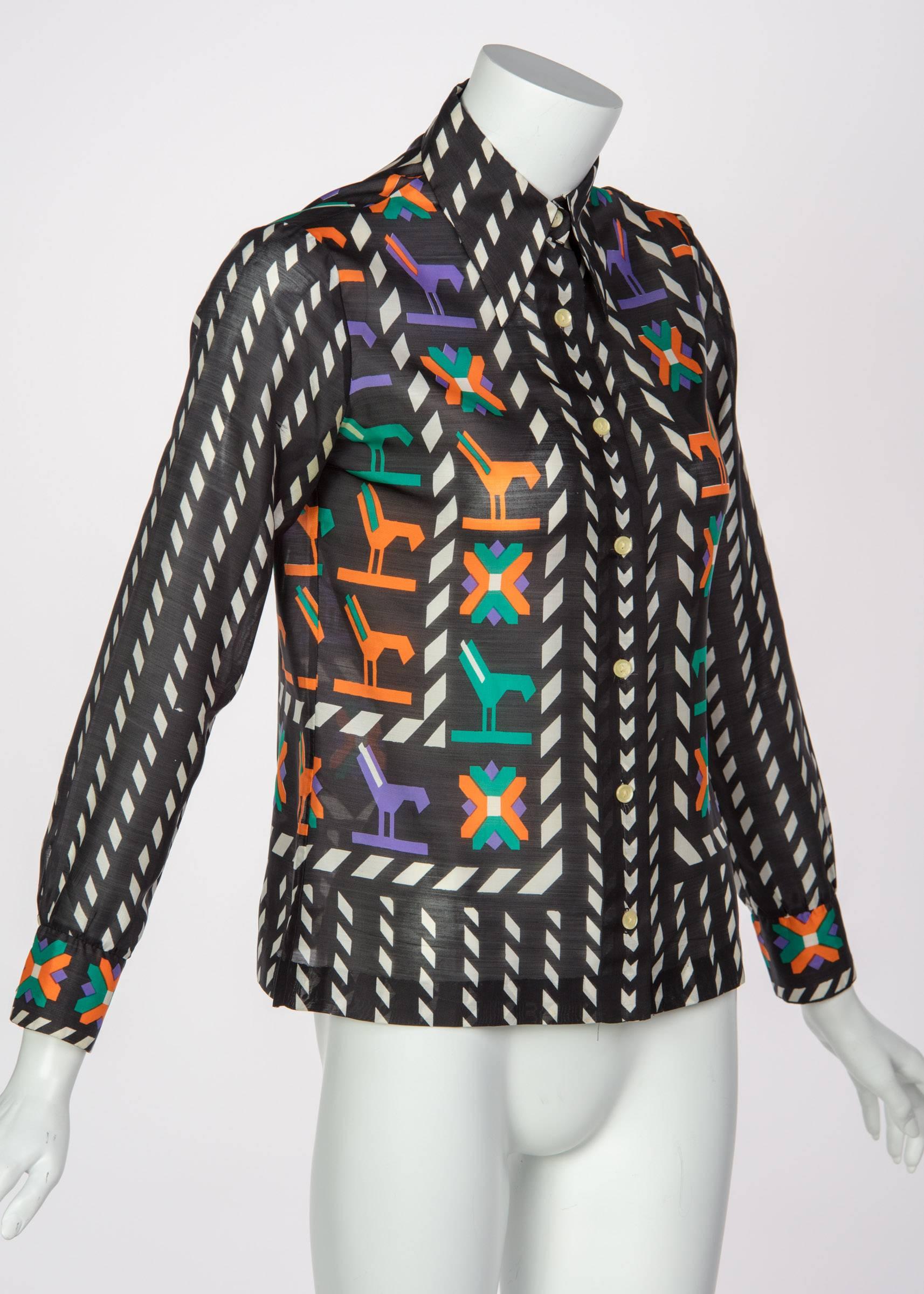 Lanvin white, orange, purple and green print blouse done in 100% silk. 
Excellent condition. Professionally cleaned and pressed.

Size estimate: XS/S
Measurements: 
Shoulders: 15 inches
Sleeves: 21.5 inches
Bust: 36 inches
Waist: 30 inches
Length: