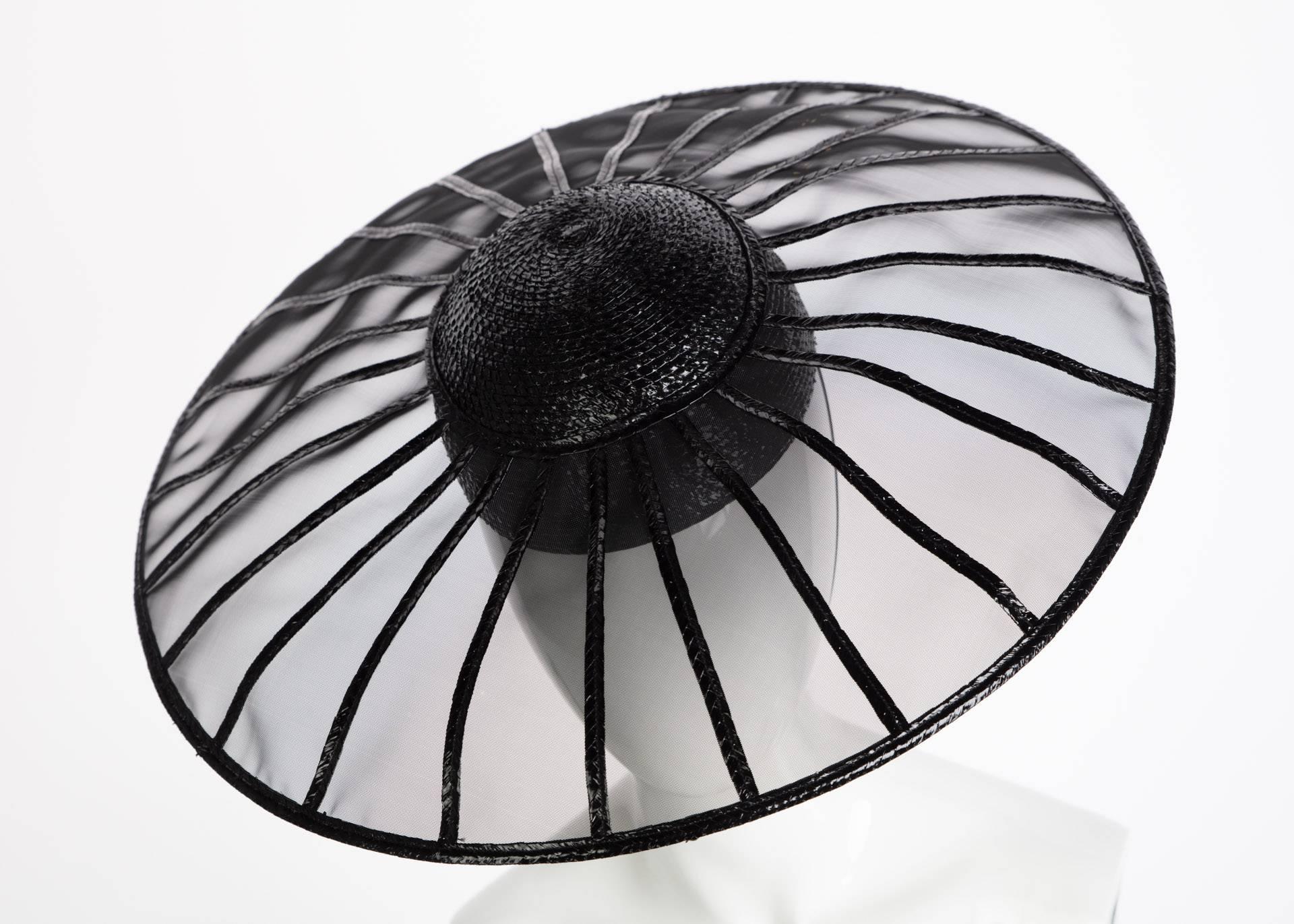 Accessories by Yves Saint Laurent speak to his design vision of sophistication and casual elegance. From refined traditional styles to exotic artistic creations, Saint Laurent has proven to be a master of millinery design. While the accessories